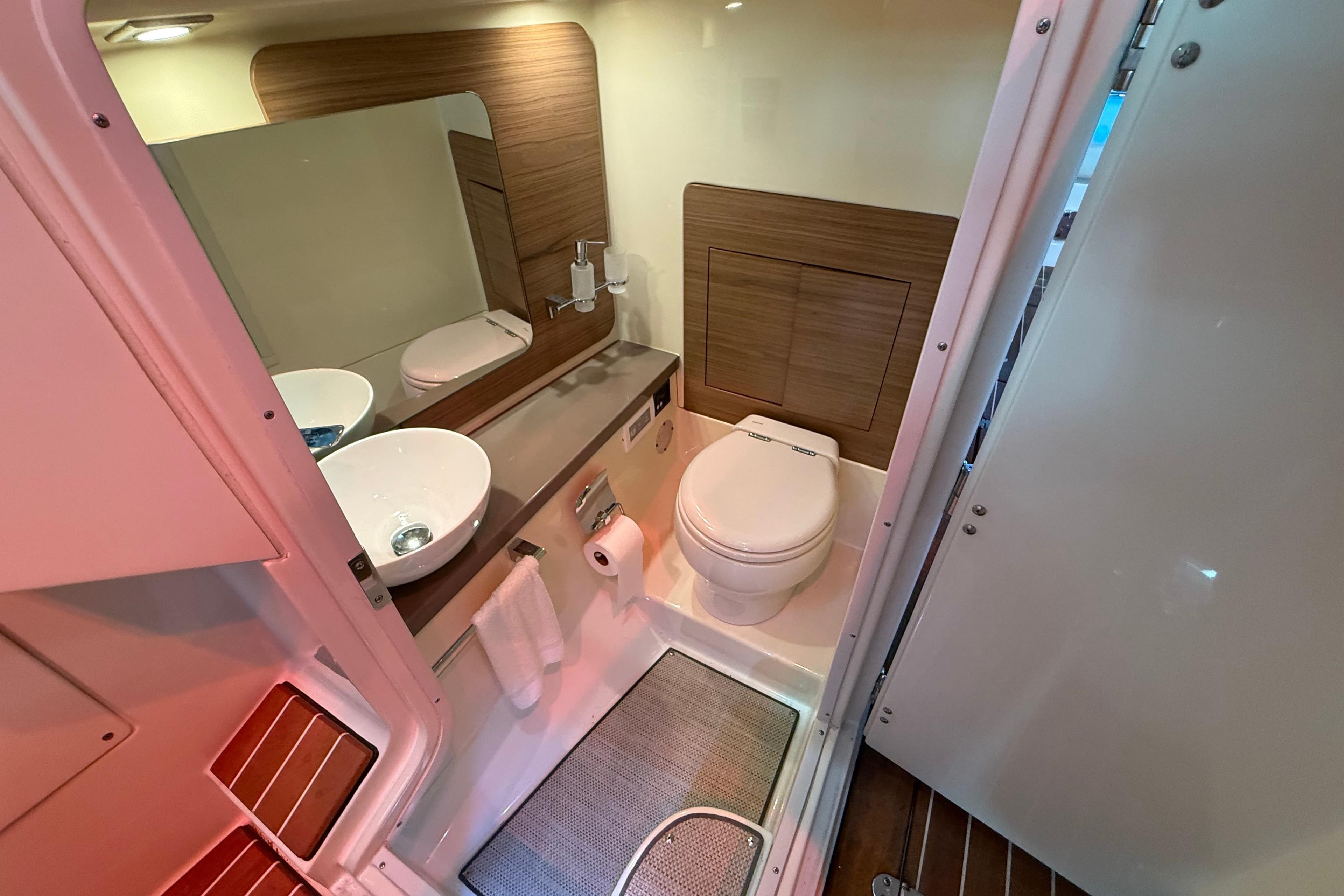 Luxurious 2021 Chris-Craft Launch 31 GT boat bathroom with modern fixtures and elegant design.