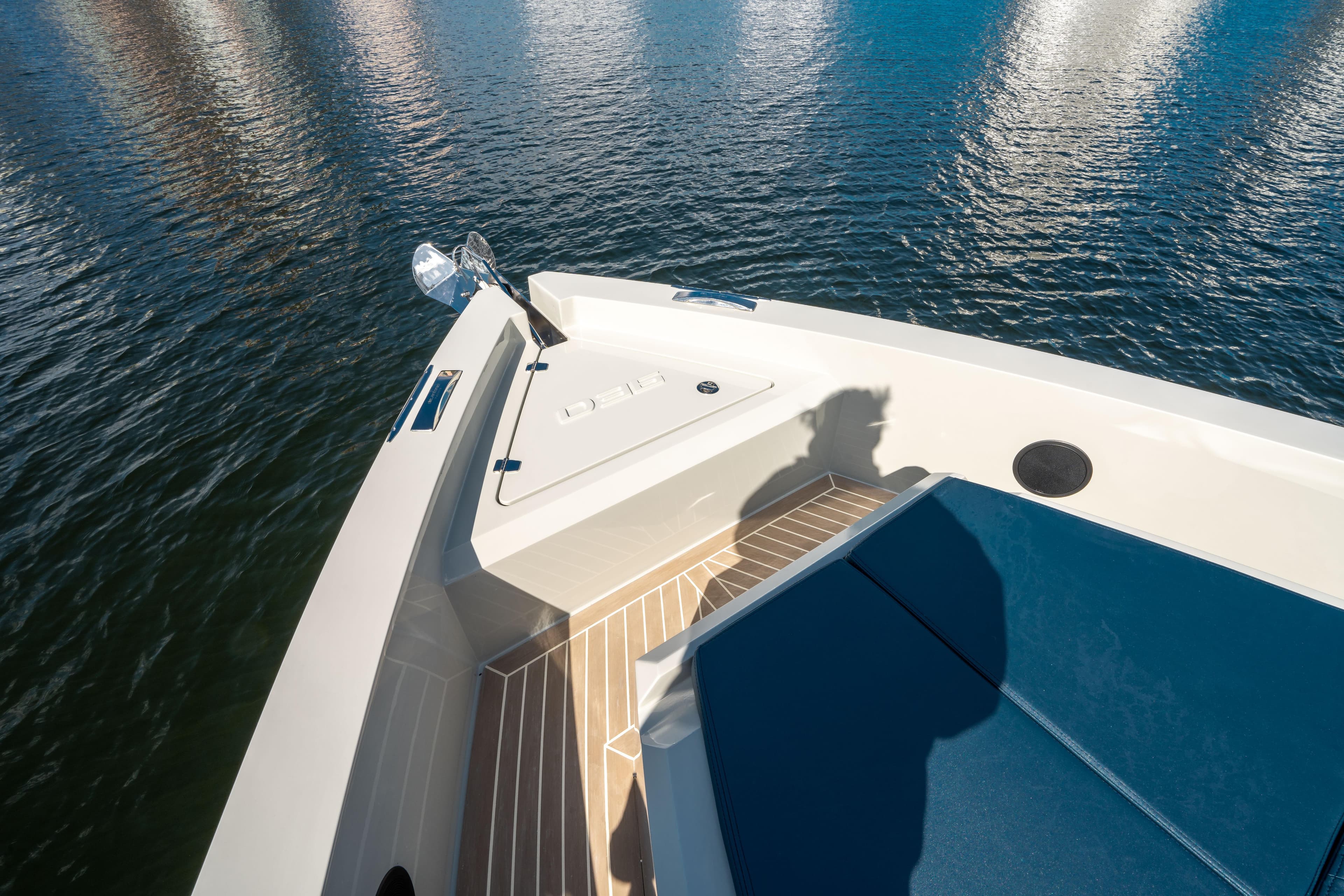 Bow of 2025 De Antonio Yachts D36 OPEN on calm water.