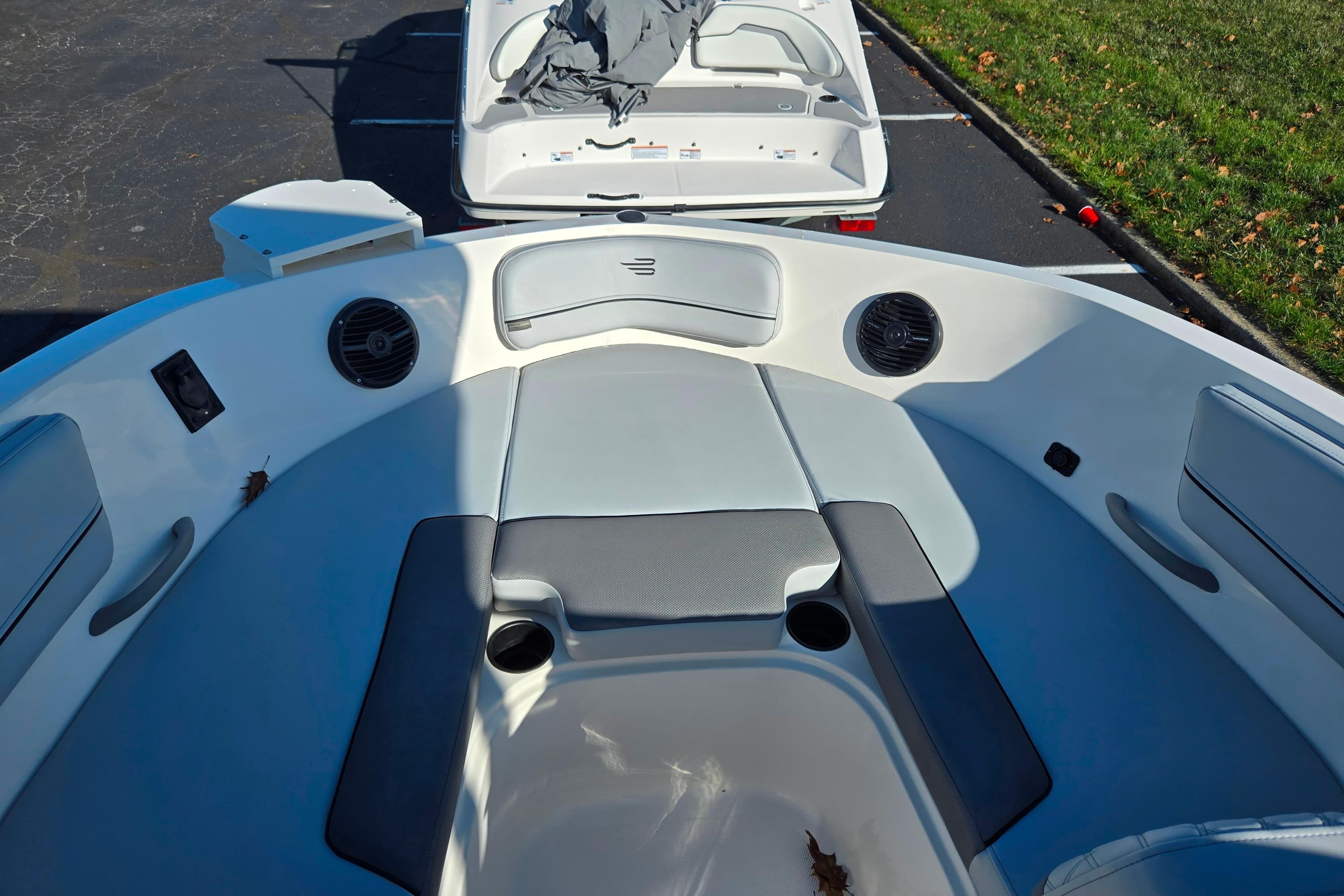 2024 Bayliner VR5 Bowrider OB interior with seating and cup holders.