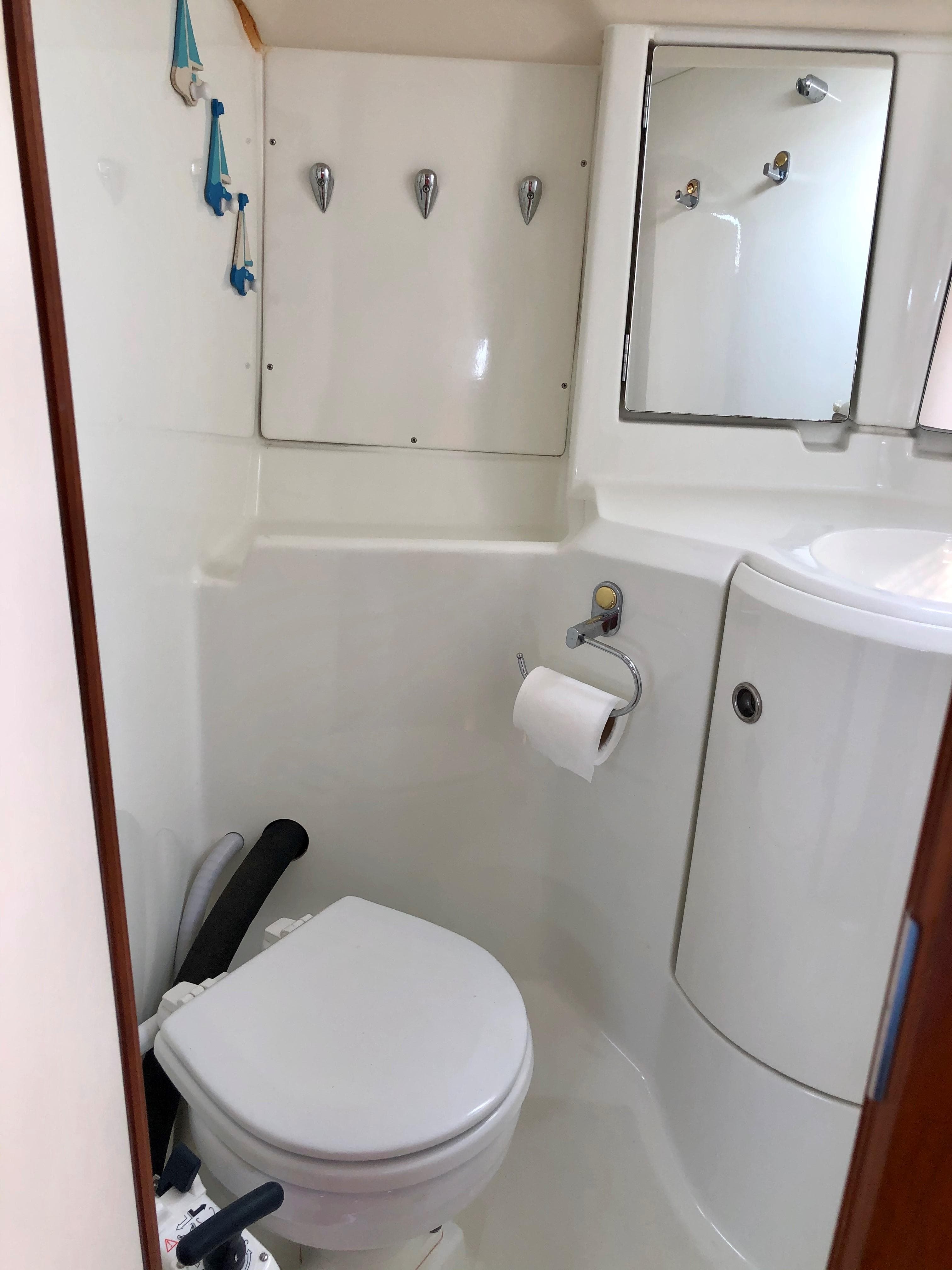 Interior view of a 1999 Beneteau Oceanis 352 bathroom.