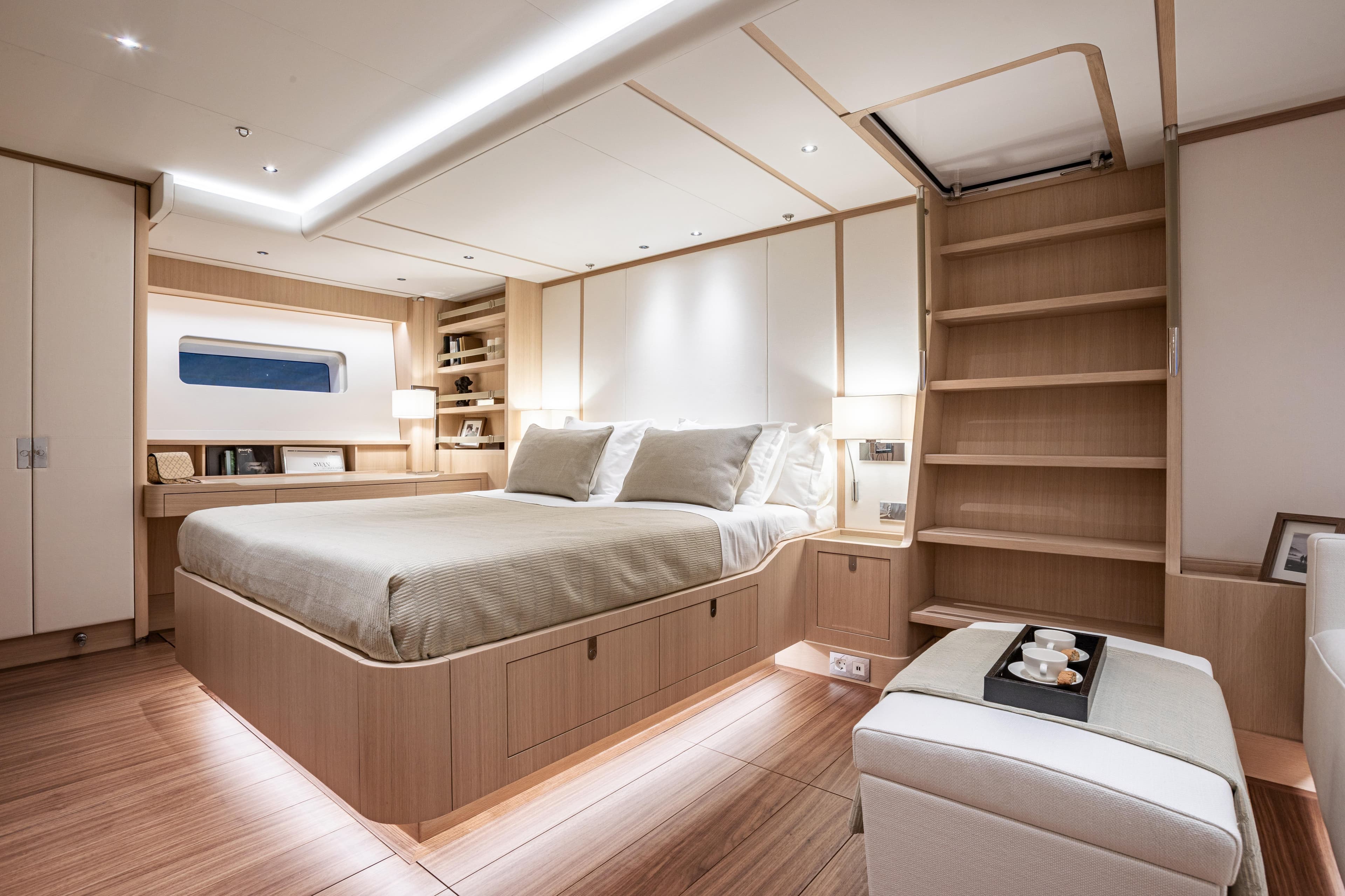 Luxurious Nautor Swan 98 yacht bedroom interior, featuring modern design and elegant furnishings, 2020 model.