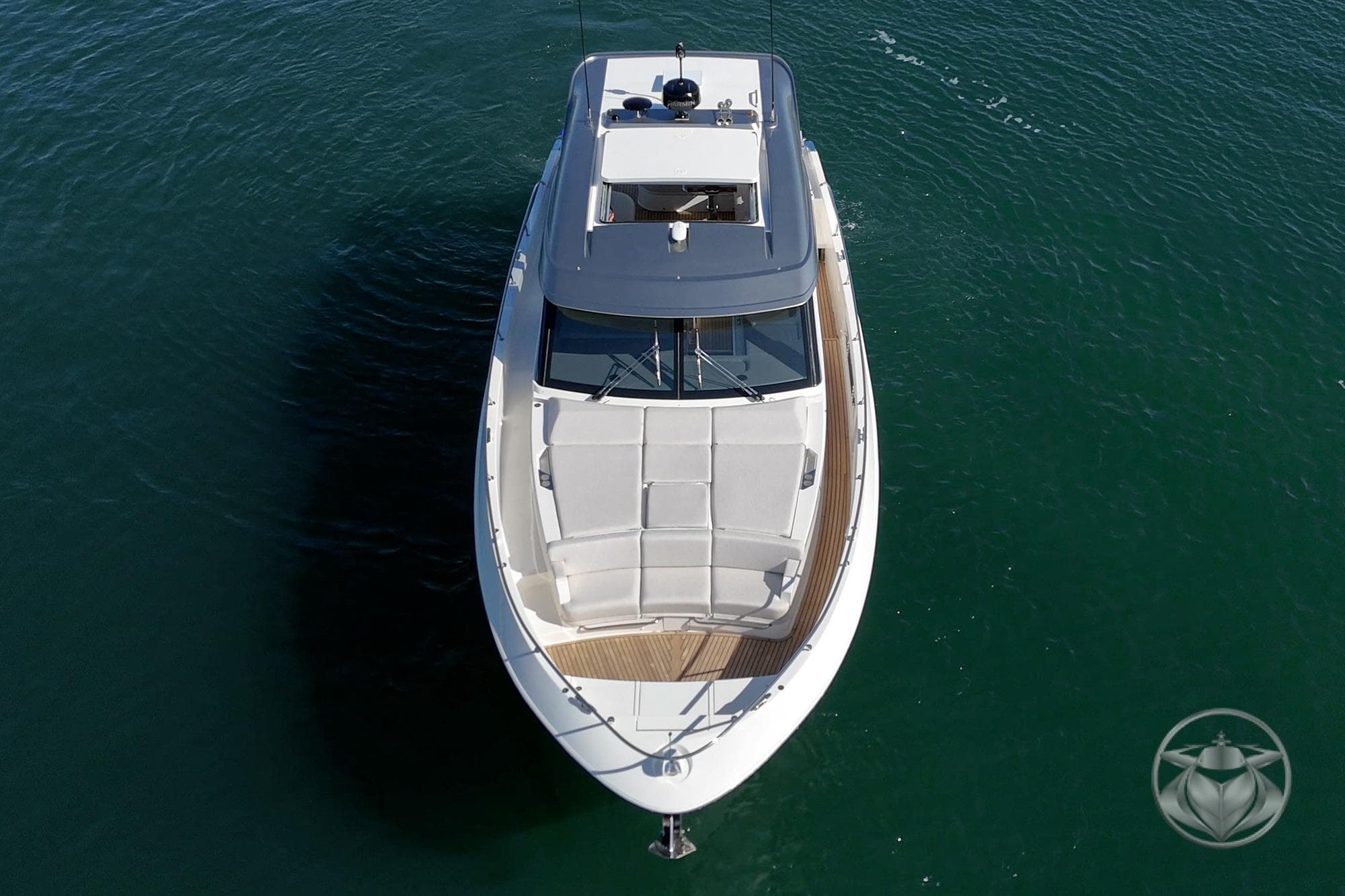 Aerial view of 2026 Riviera 4300 Sport Express yacht on calm water.