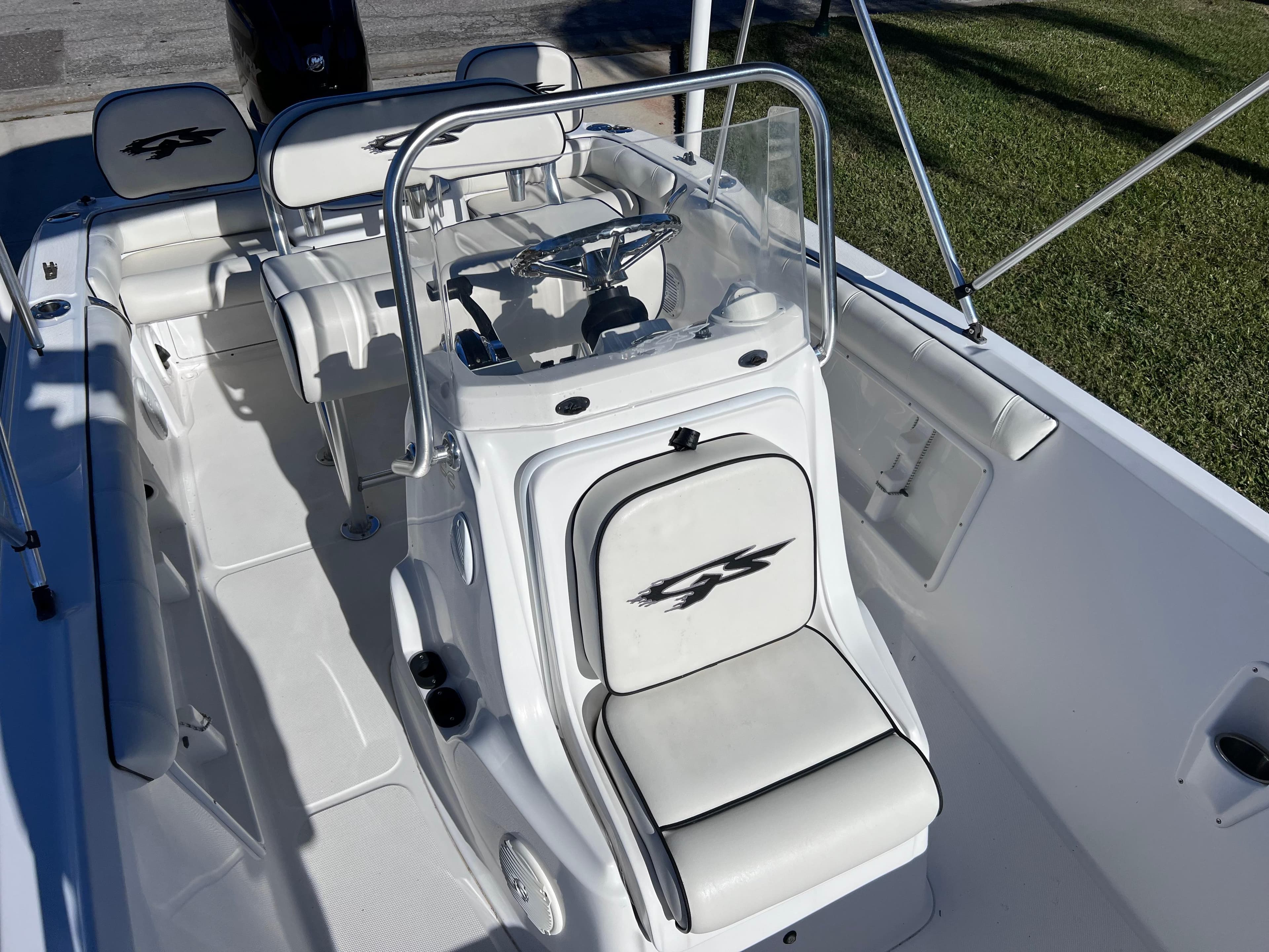 2021 Glasstream 180 CC boat interior with steering console and seating, Mercury 115 engine.