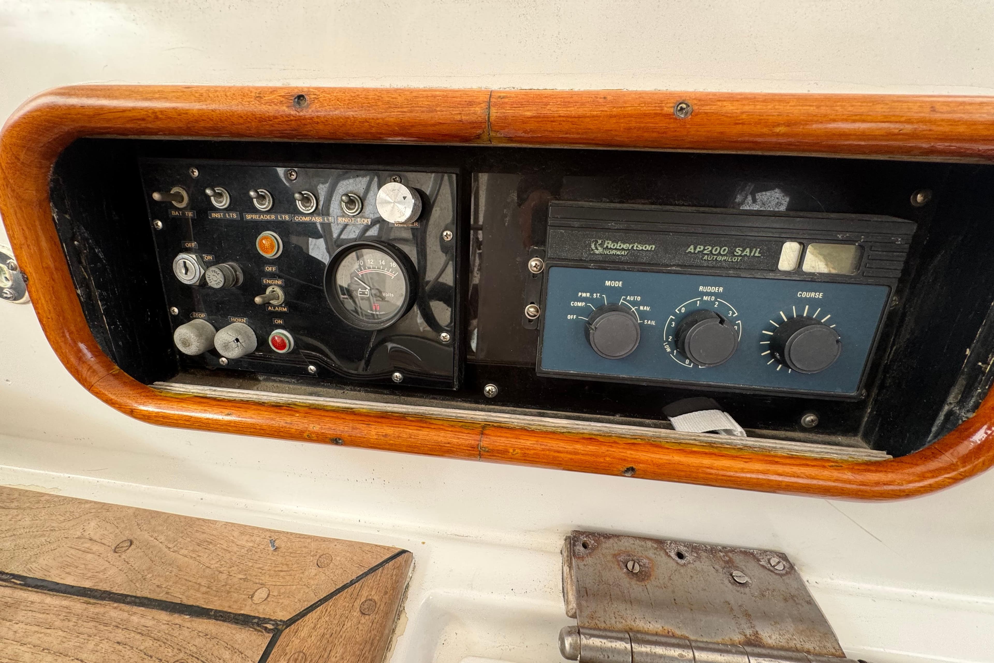 Control panel of a 1978 Robert Perry 47 sailboat with autopilot system.