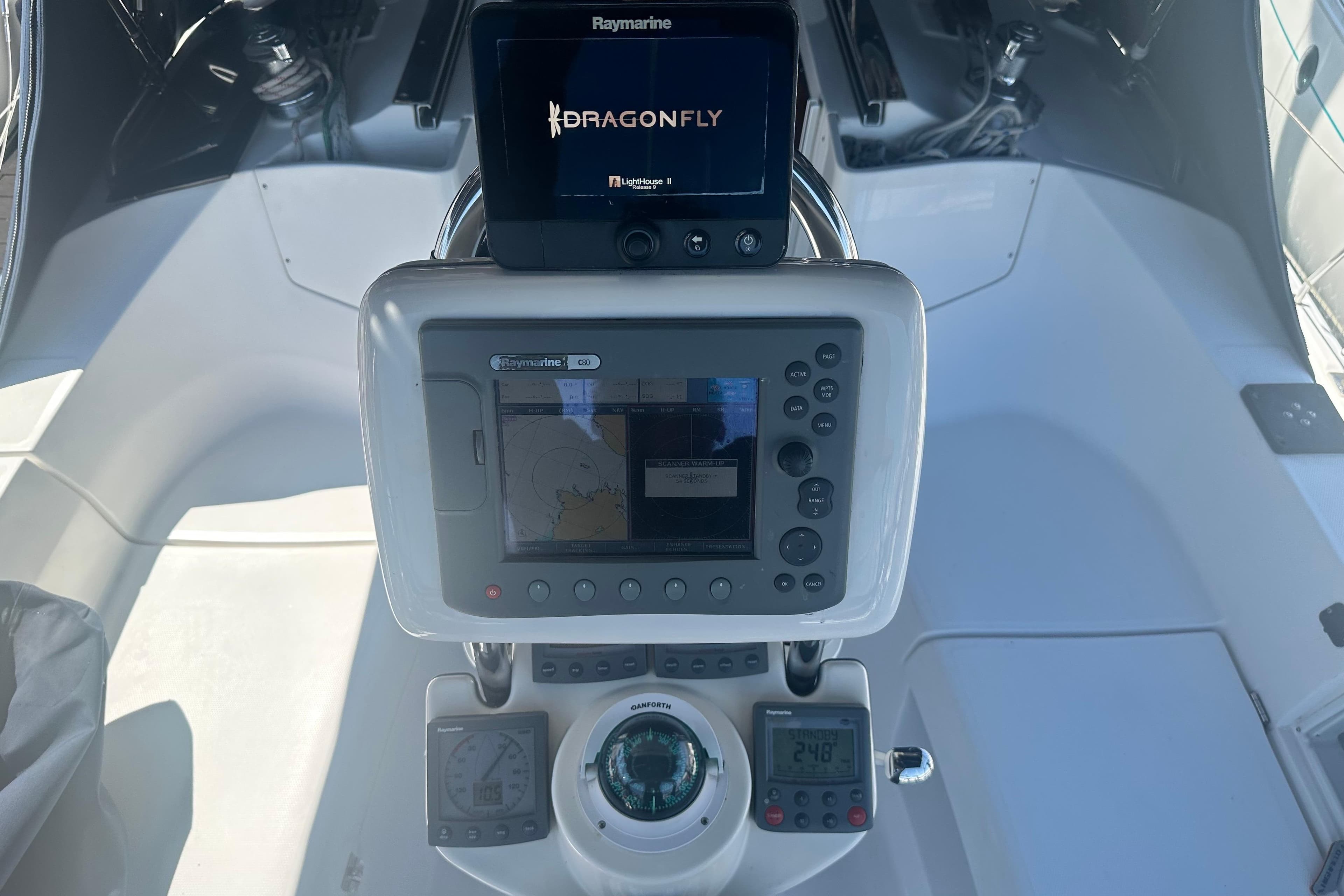 Cockpit of 2008 Hunter 33 sailboat with Raymarine navigation equipment.