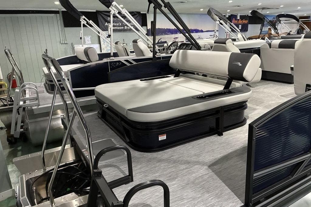 2026 Bennington S Swingback 22 SSB SPS pontoon boat in showroom display.