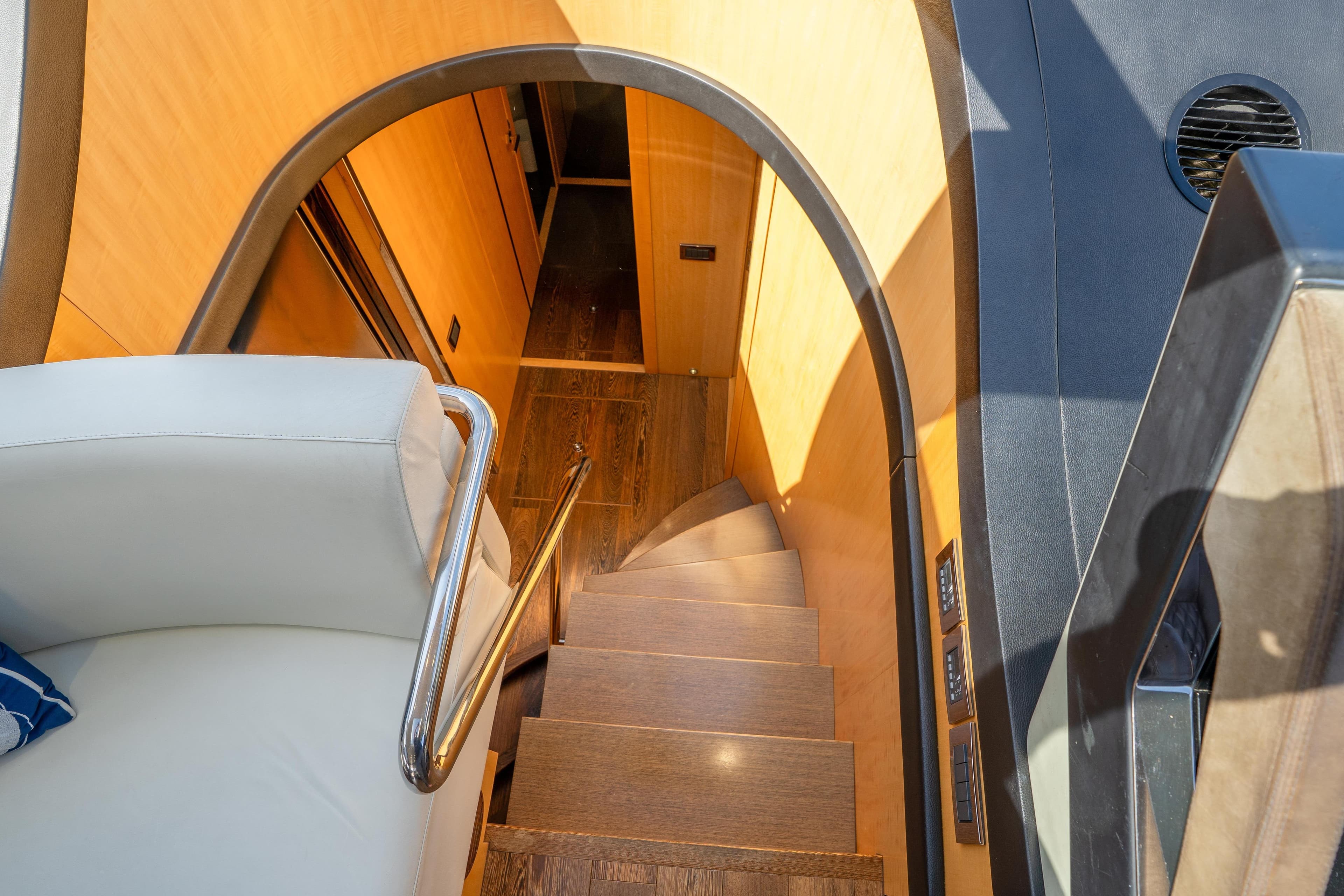 Interior staircase of 2014 Sunseeker 68 Sport Yacht with wooden steps and modern design.