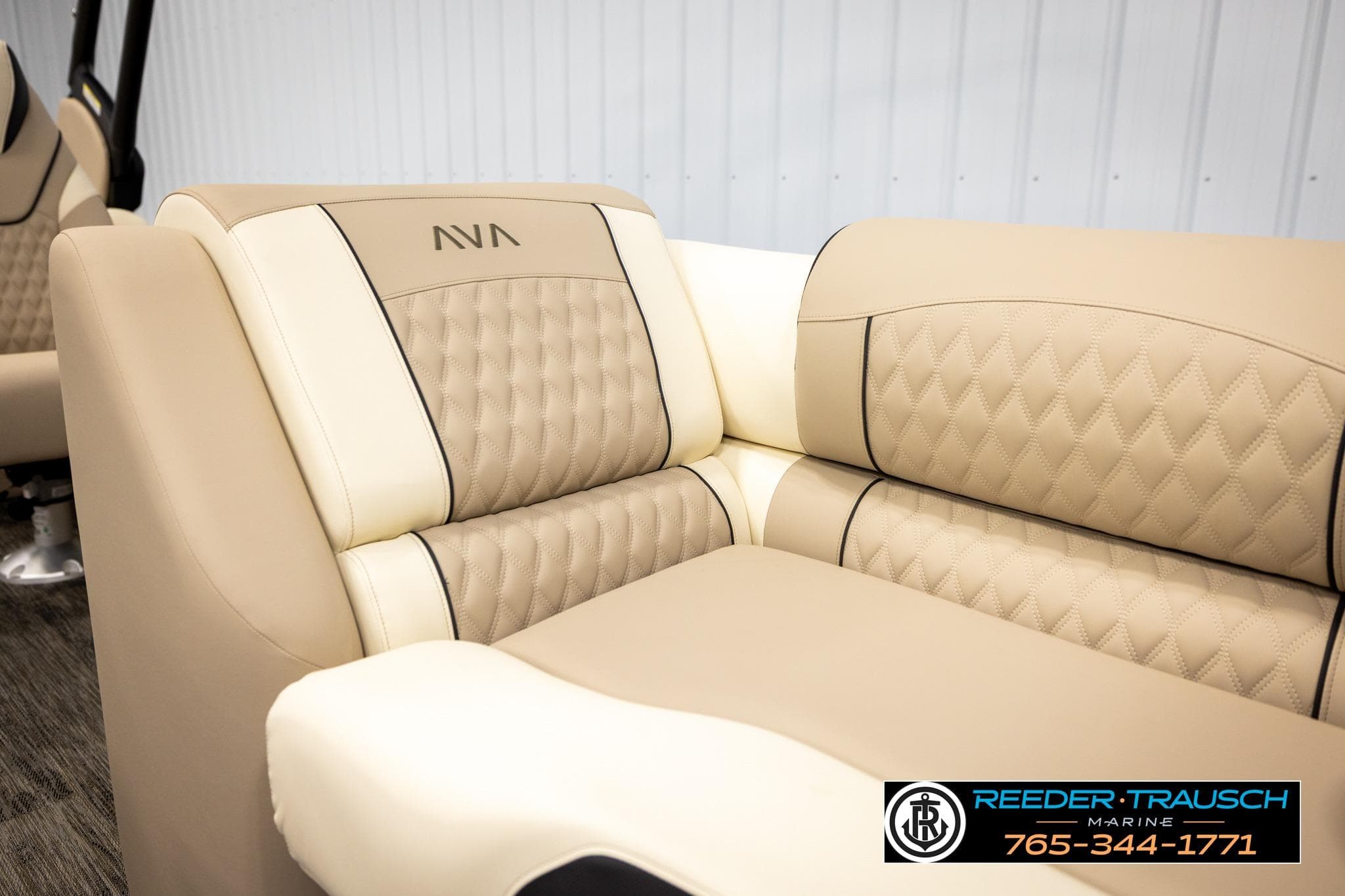Luxurious beige seating in 2026 Avalon CAT QLS boat, featuring diamond stitching and elegant design.