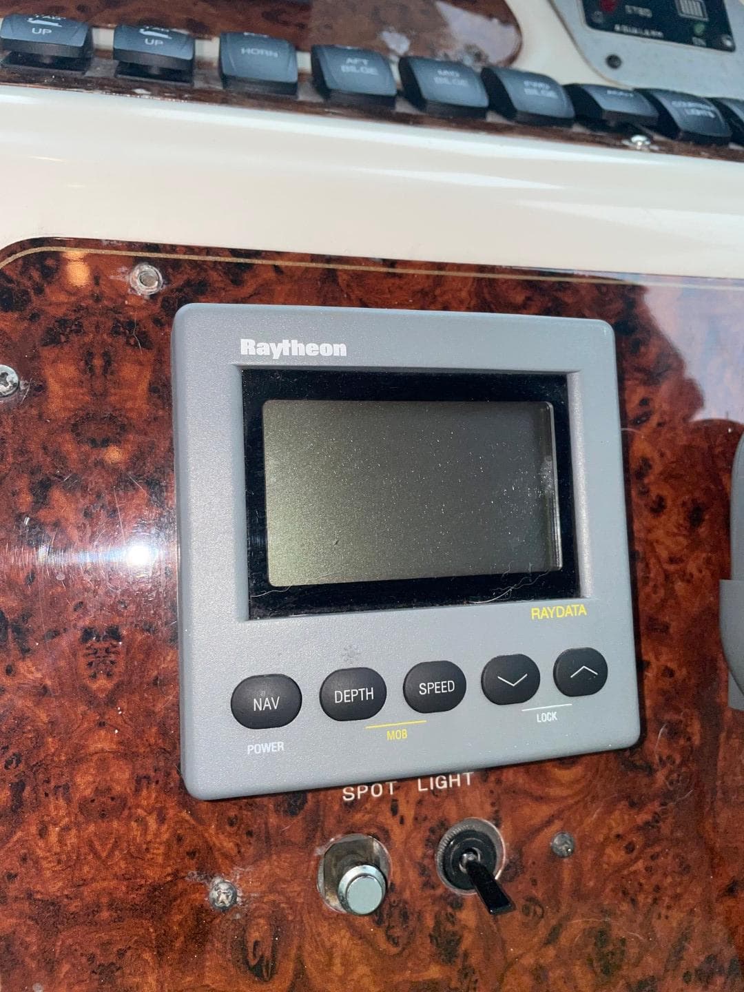 Raytheon navigation display on 1997 Maxum 4600 Custom SCB yacht dashboard.