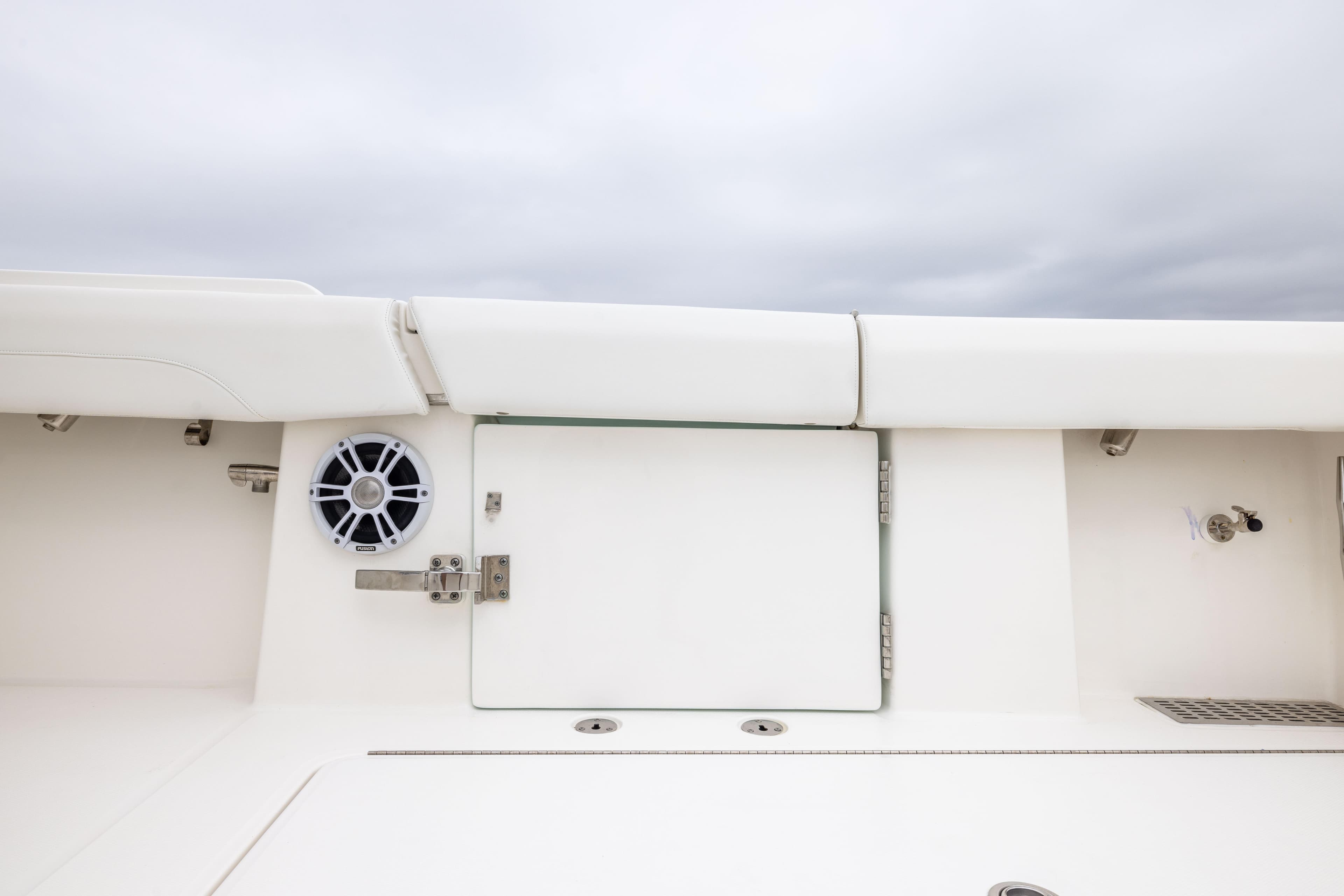 2023 Regulator 37 boat interior with speaker and storage compartment.