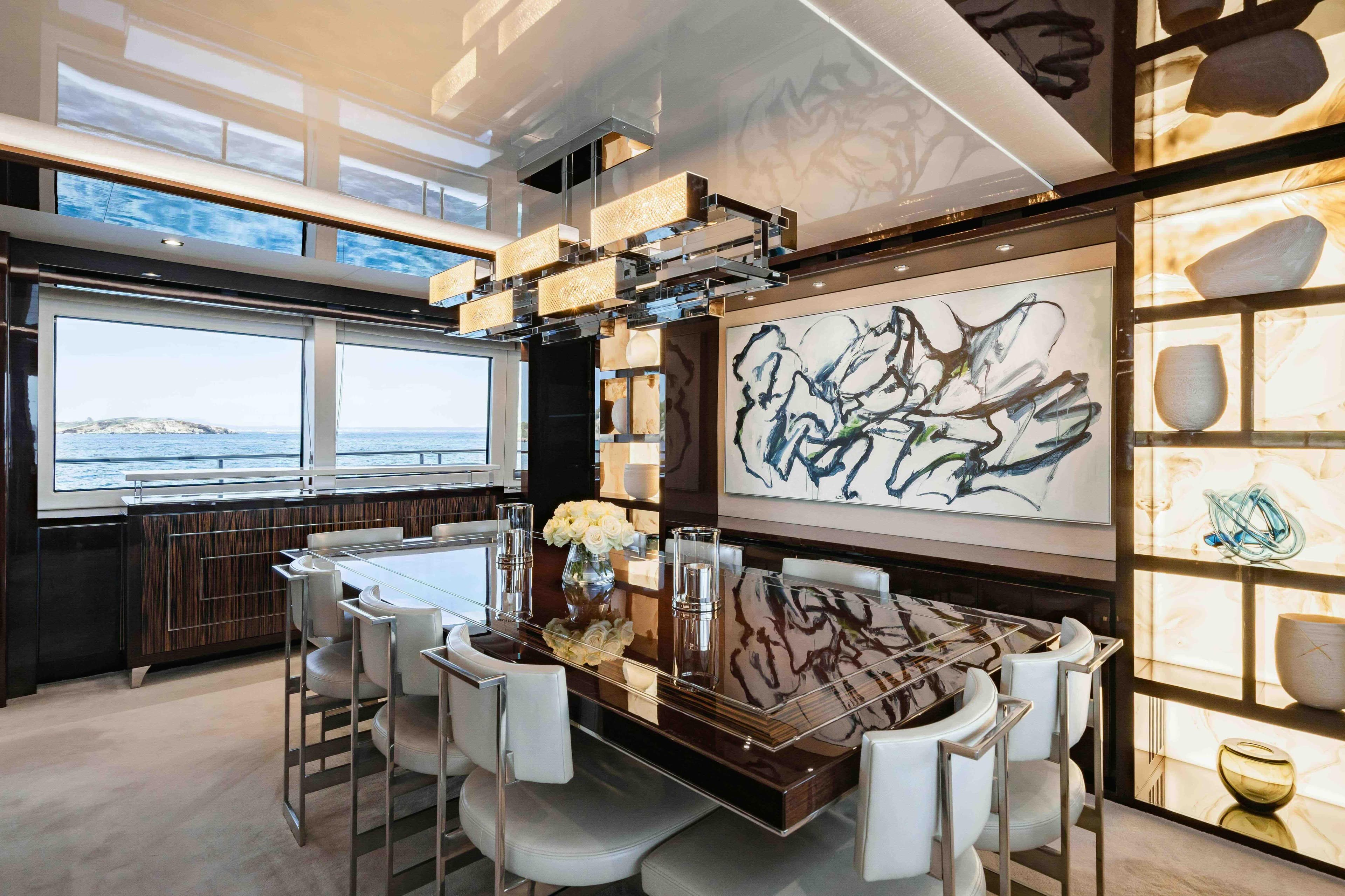 Luxurious dining area on 2016 Sunseeker 131 Yacht with elegant decor and ocean views.