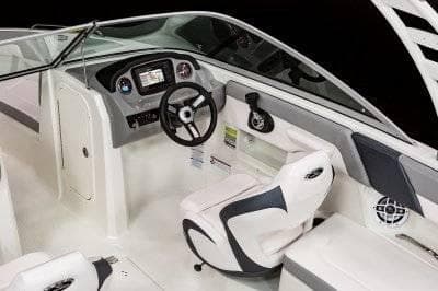 2025 Chaparral 23 SSI SPORT boat interior with modern dashboard and seating.