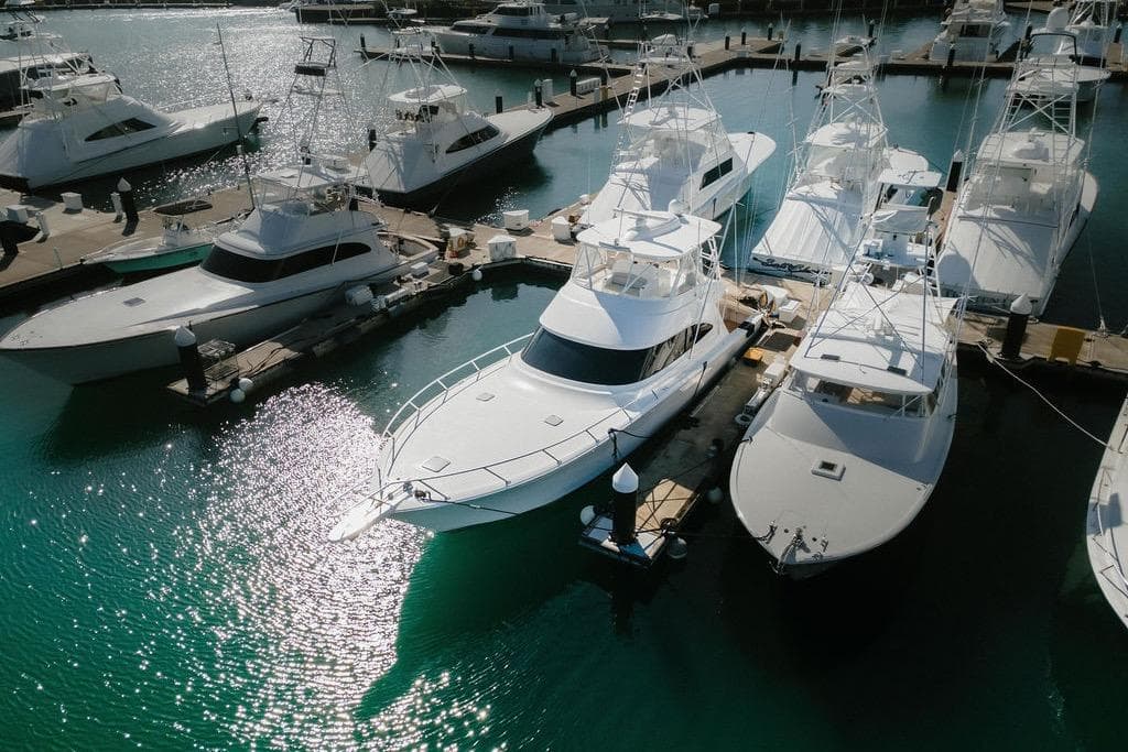 Aerial view of 2021 Viking 58 Convertible yacht docked in a marina.