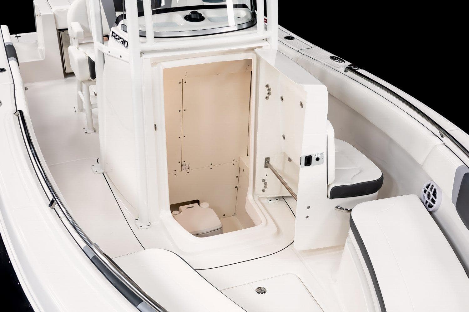 2025 Robalo R230 Center Console boat interior with open storage compartment.