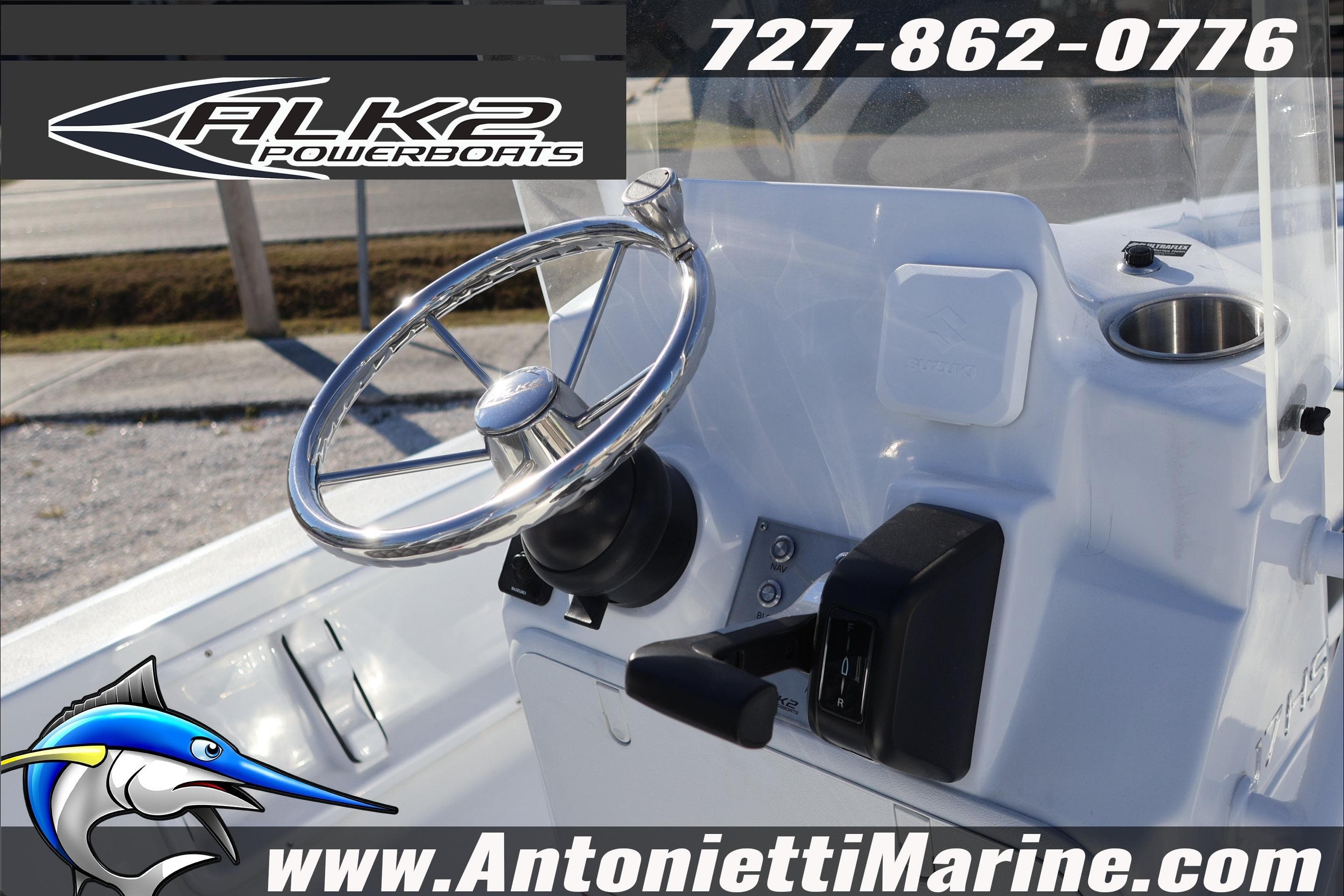 Steering console of 2026 ALK2 Powerboats 17HS, featuring sleek design and controls.