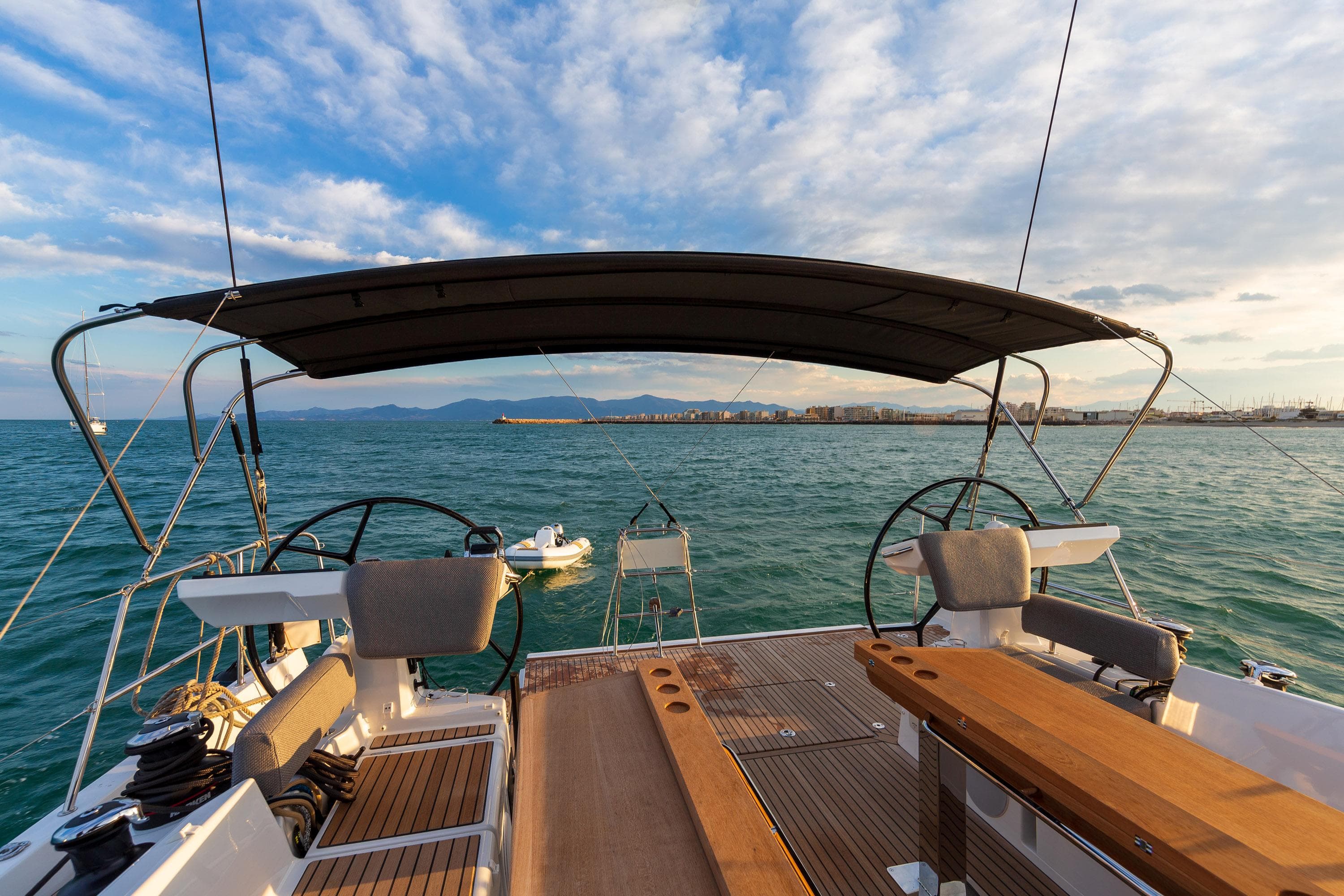 2026 Jeanneau Yachts 60 sailing on open water under a clear sky.