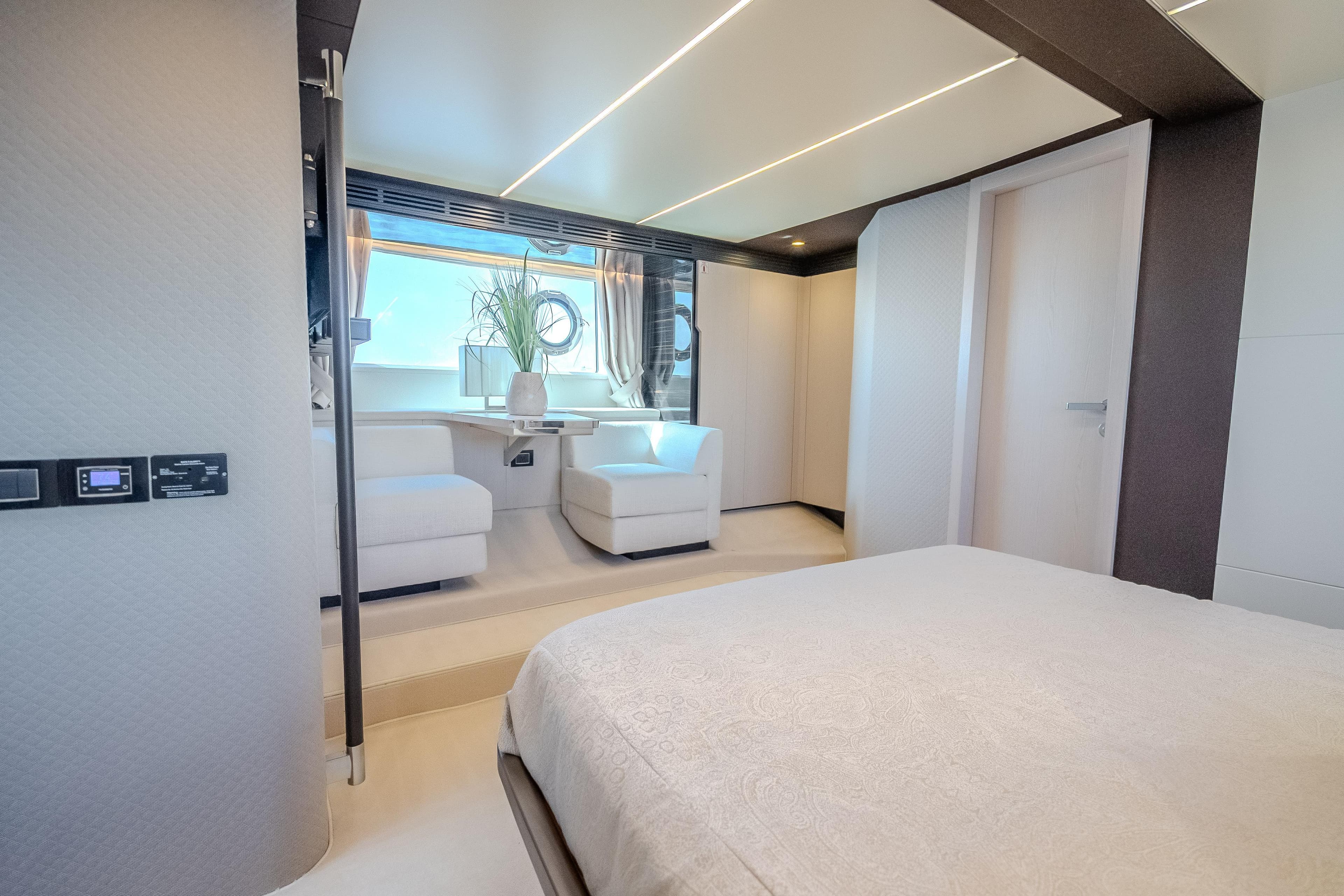 Luxurious interior of 2019 Azimut 66 yacht with modern seating and elegant decor.