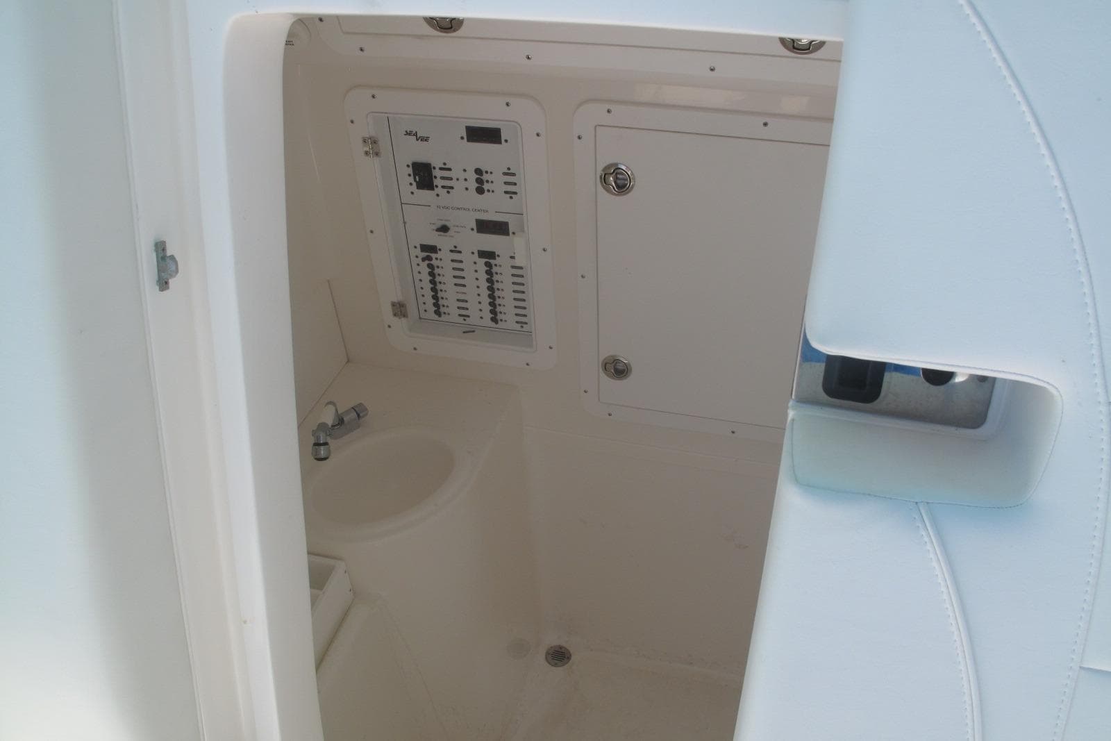 2024 SeaVee 370z boat interior with control panel and sink.