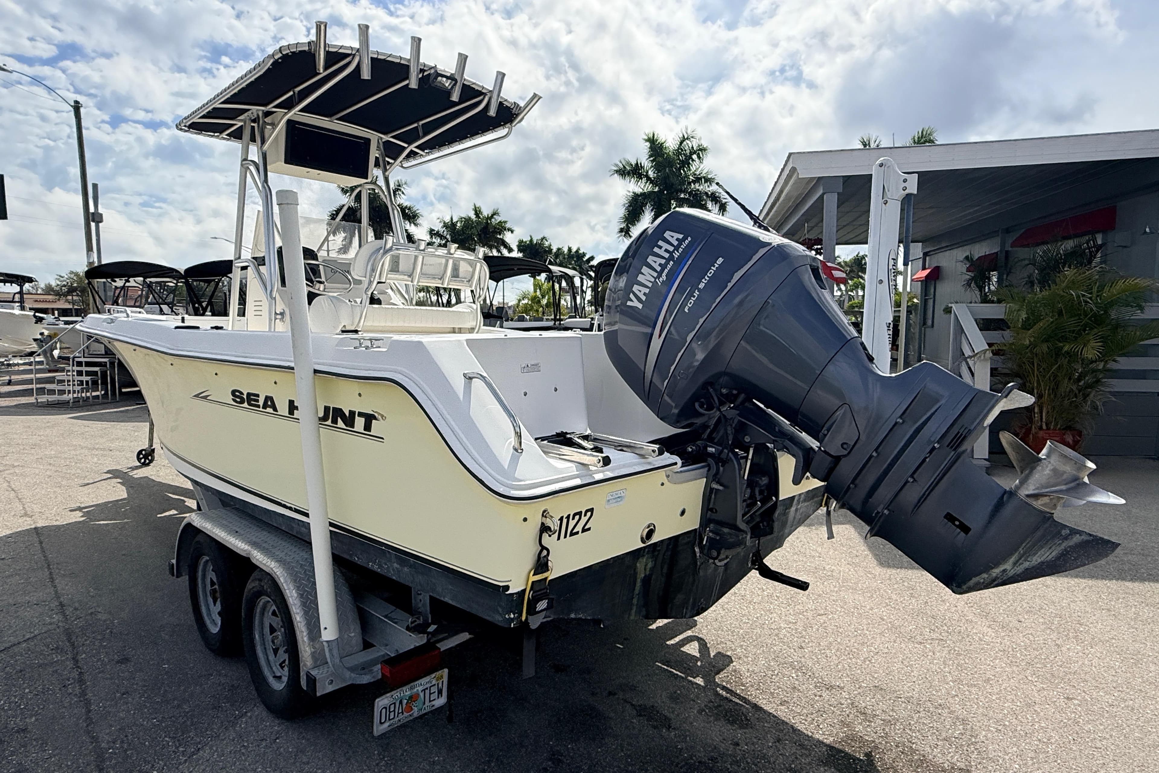 2006 Sea Hunt Triton 220 boat with Yamaha outboard motor on trailer.