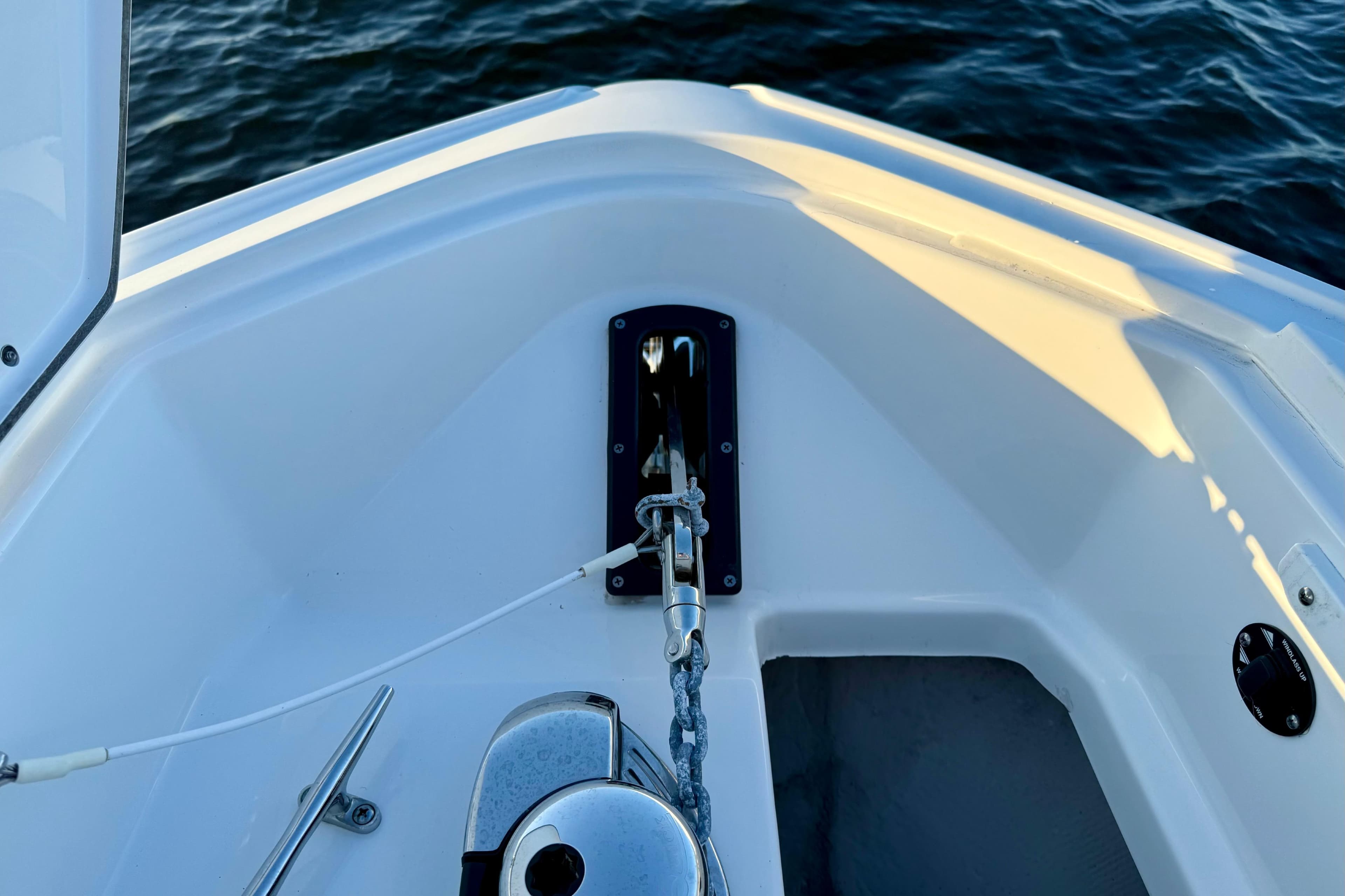 Bow of 2022 Monterey 385SS Super Sport boat with anchor chain and water view.