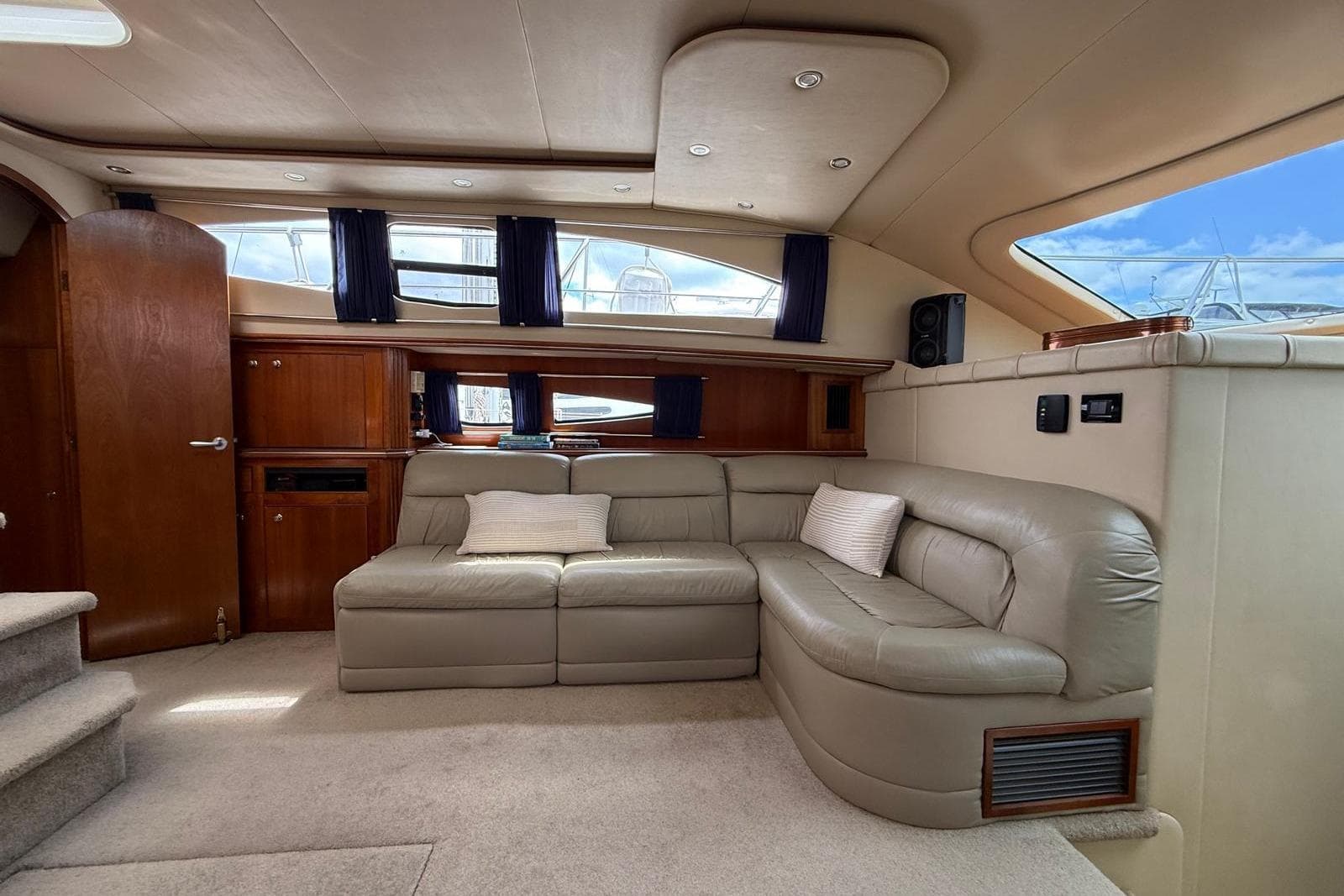 Luxurious interior of 2005 Cruisers Yachts 455 Express Motoryacht with plush seating and elegant design.