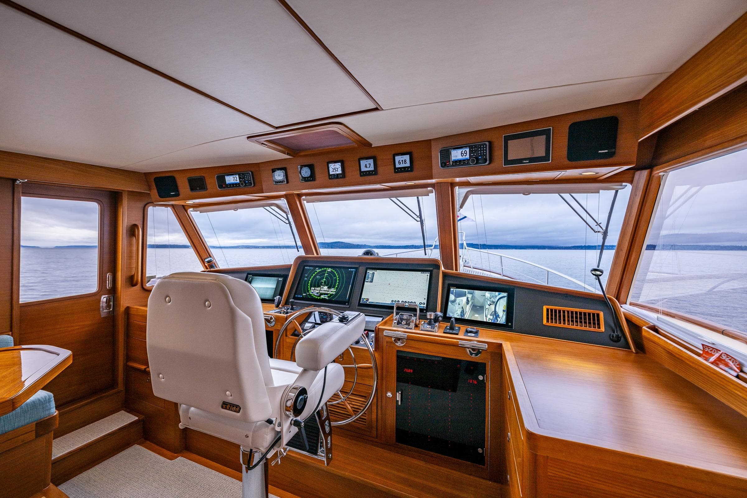 Modern Fleming 55 Pilothouse yacht interior with advanced navigation systems, 2026 model.