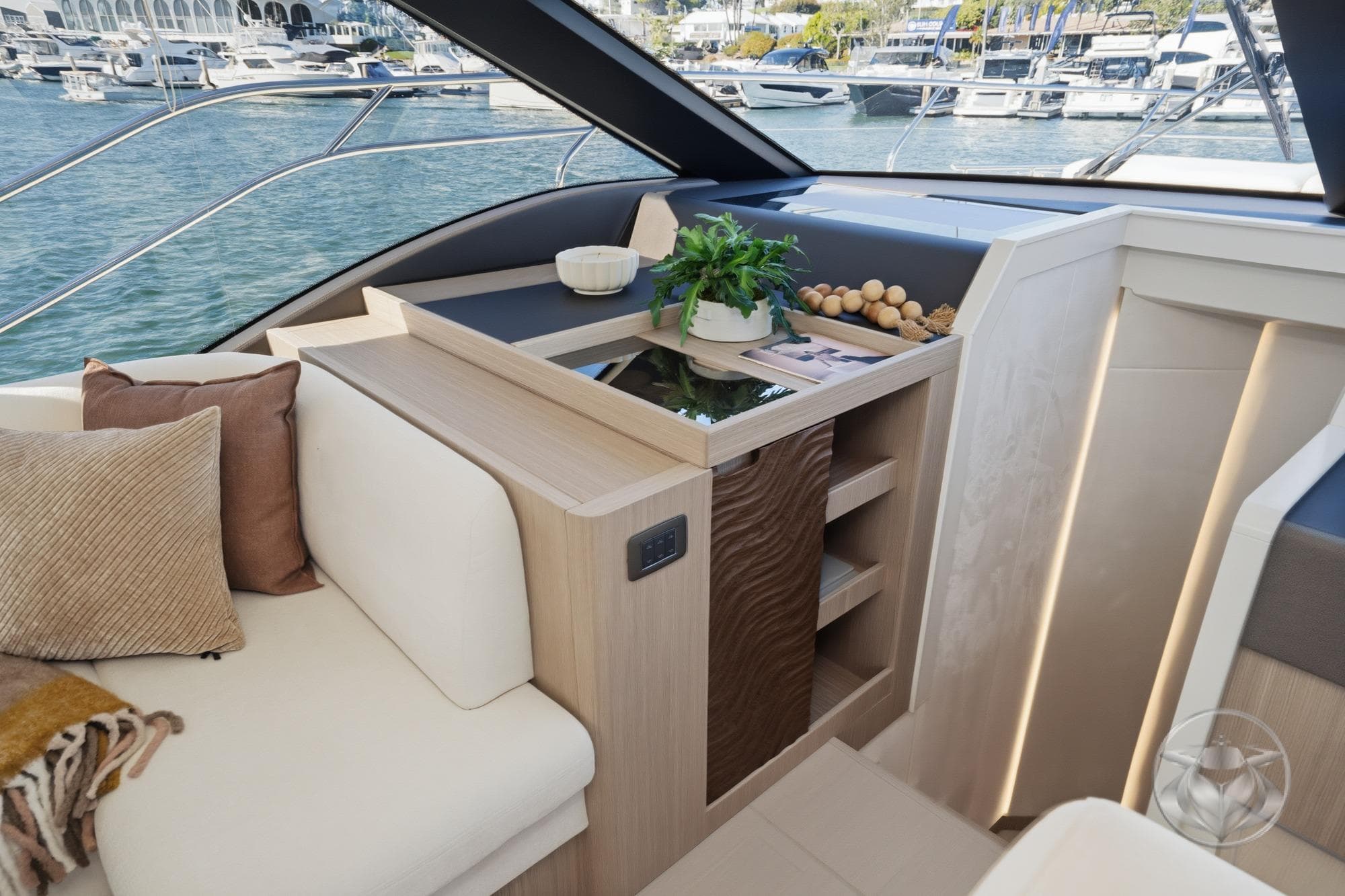 Luxurious interior of 2026 Prestige F5.7 yacht with elegant seating and decor.