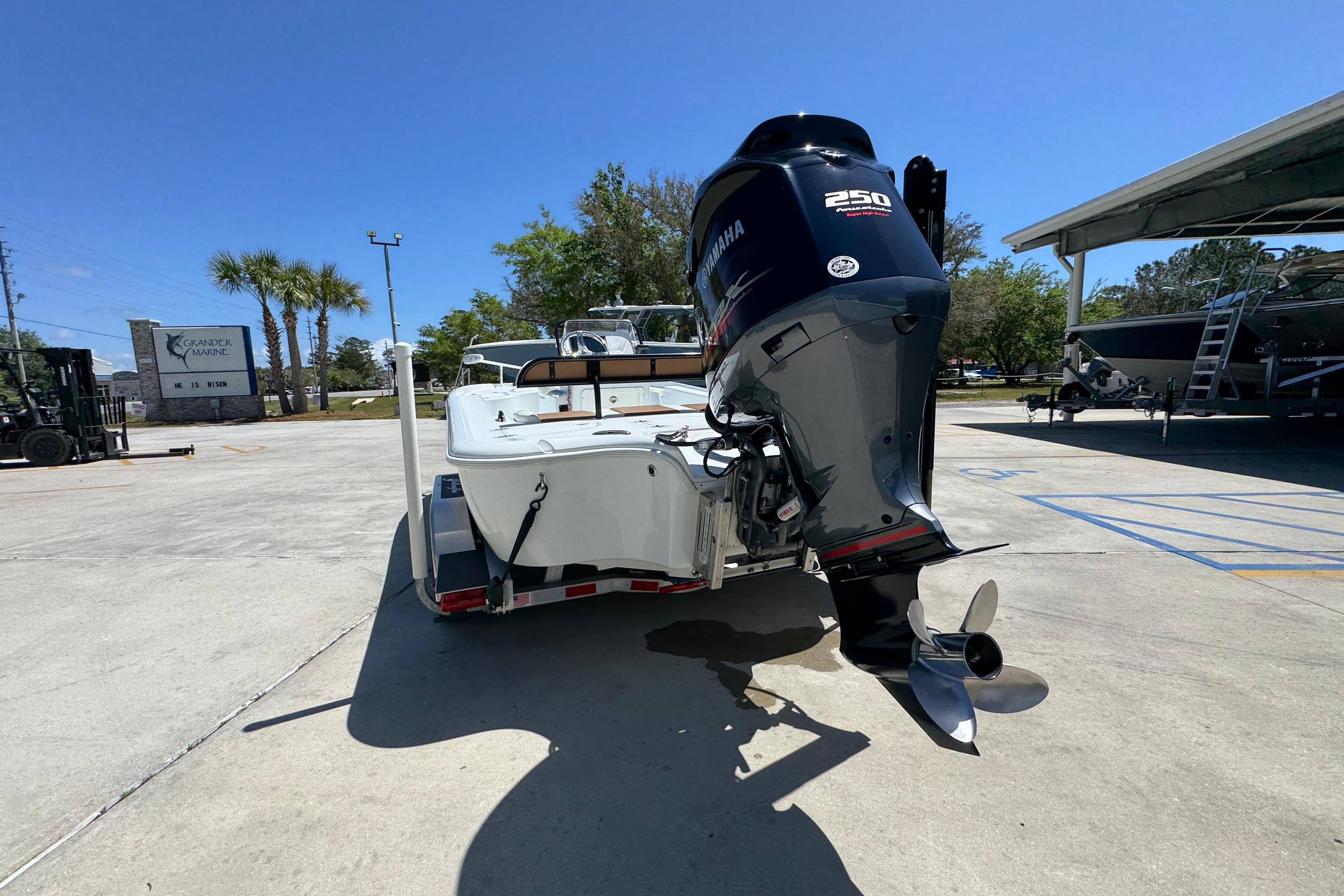 2016 Yellowfin 21 Hybrid boat with Yamaha 250 engine on trailer.