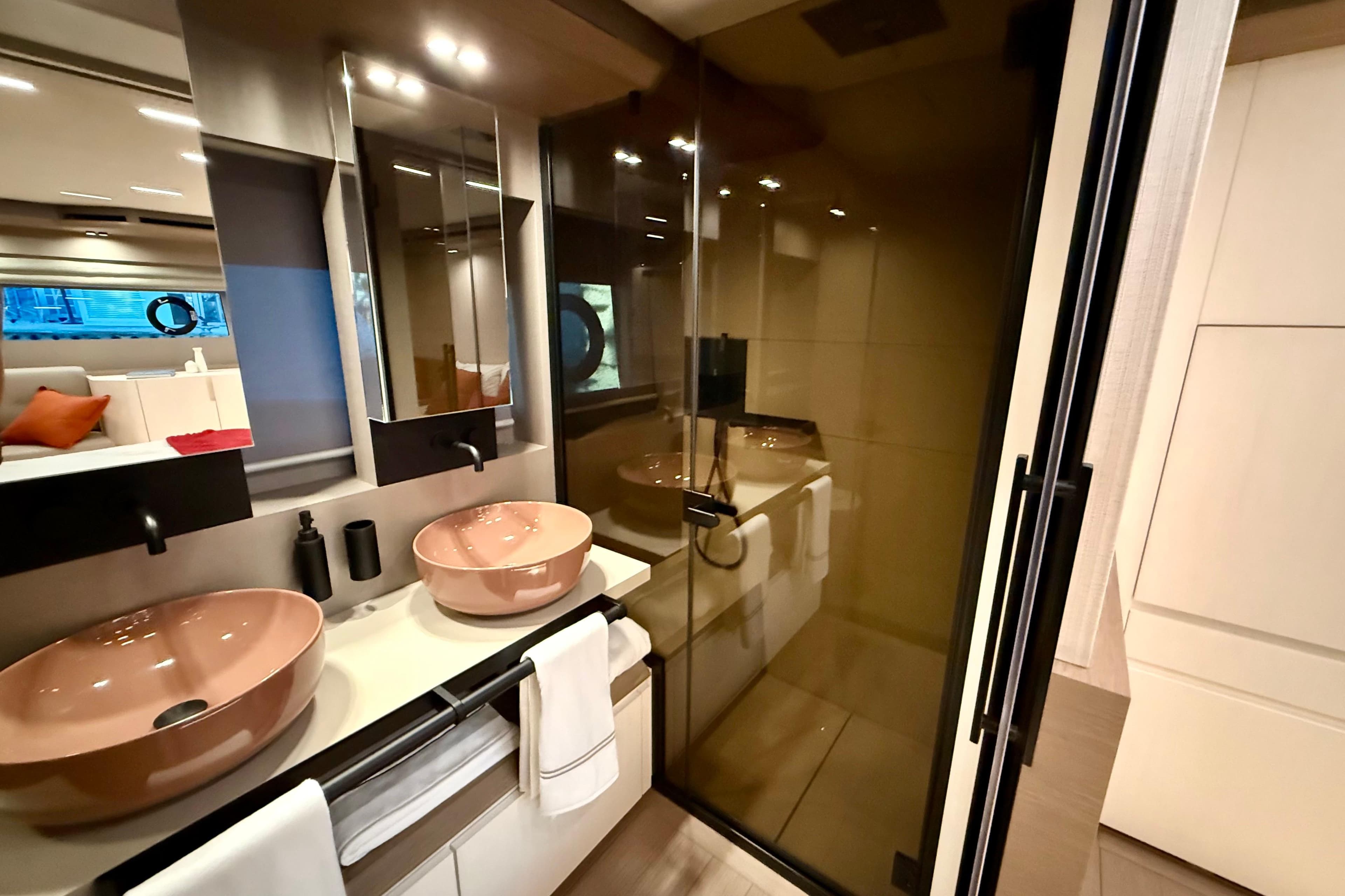 Luxurious bathroom in 2026 Pardo Yachts E72 with dual sinks and modern shower.