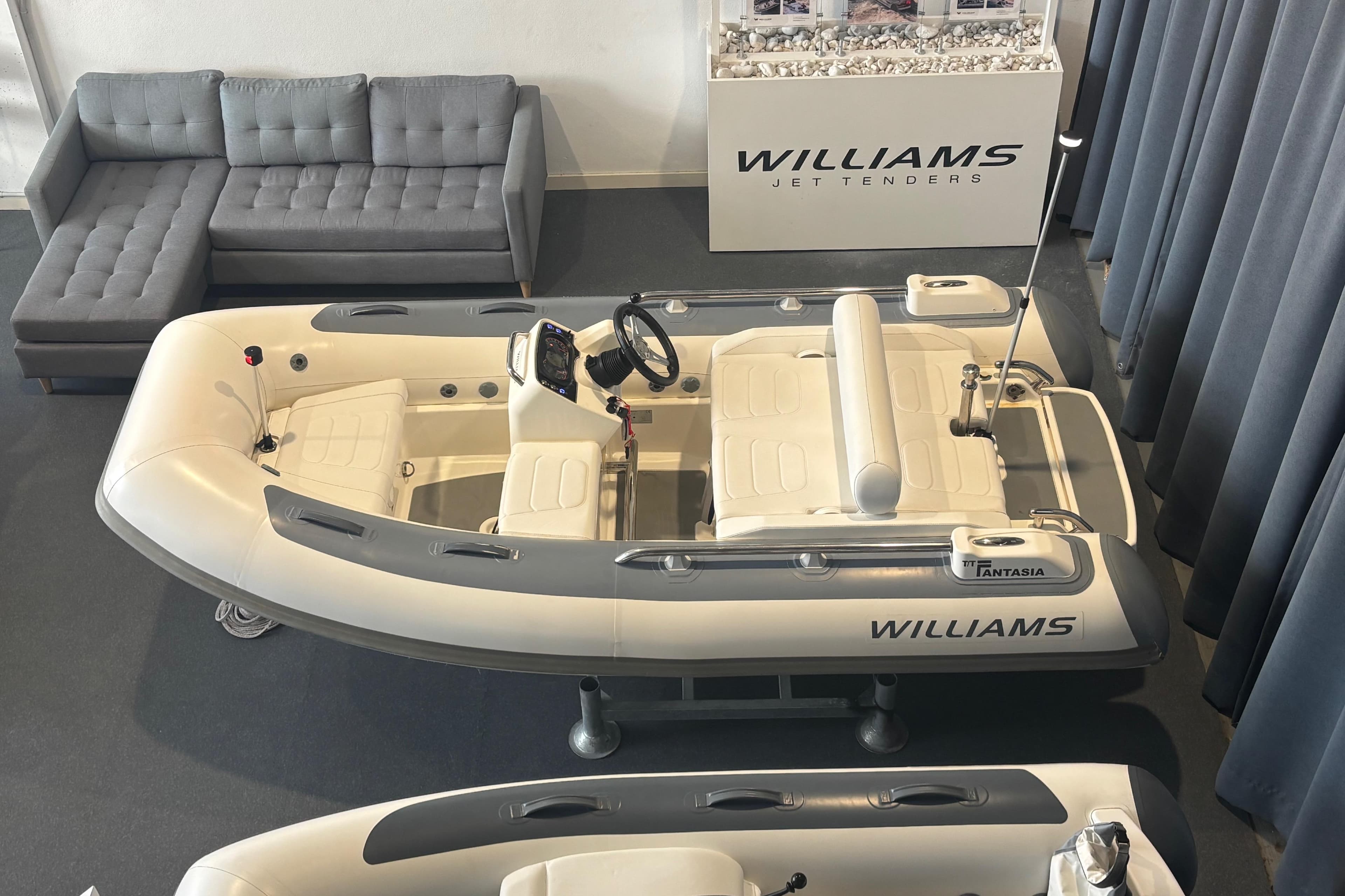 2018 Williams Jet Tenders Sportjet 345 displayed indoors with seating and controls.