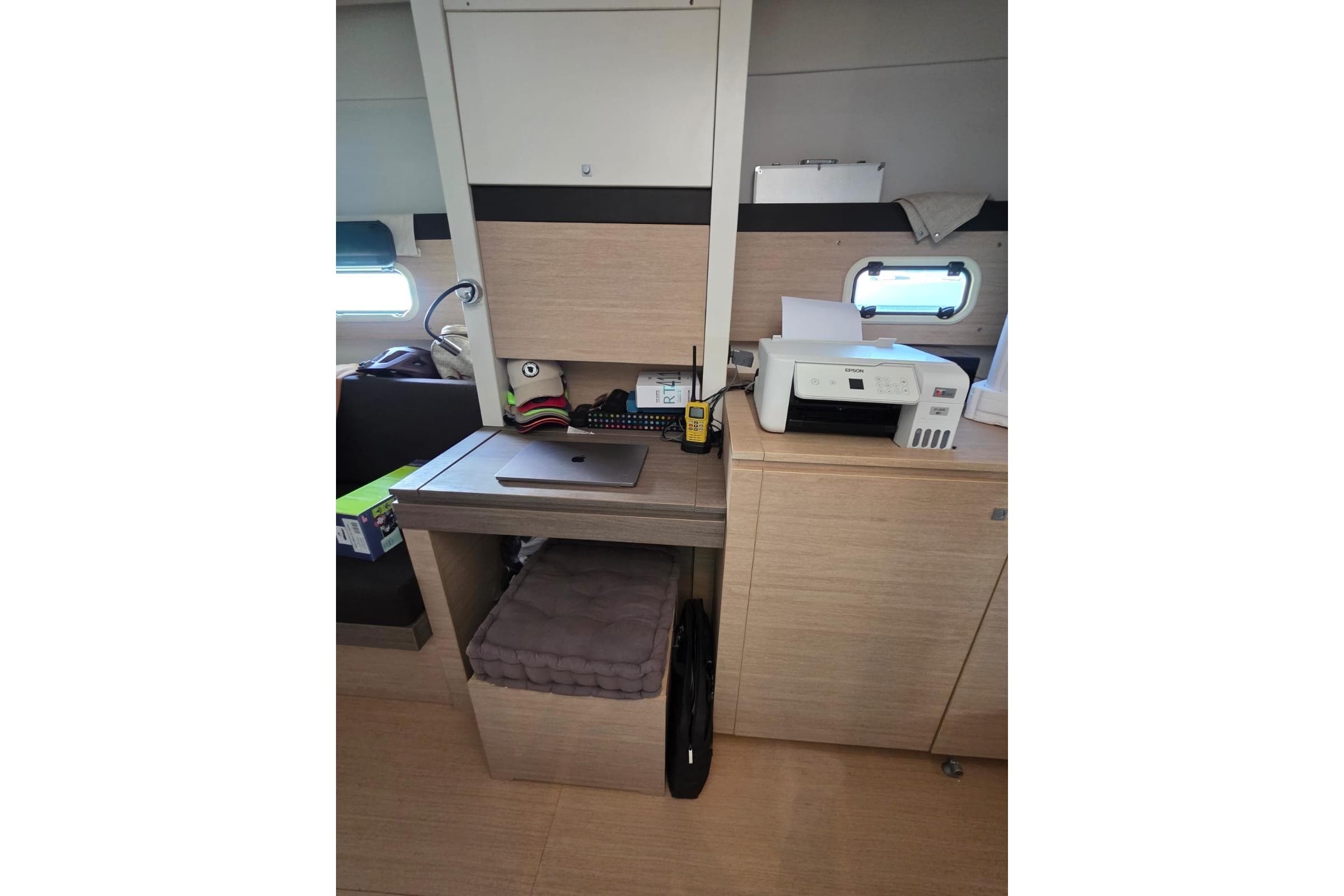 Interior of a 2016 Bali 4.5 yacht with a compact workspace and printer.
