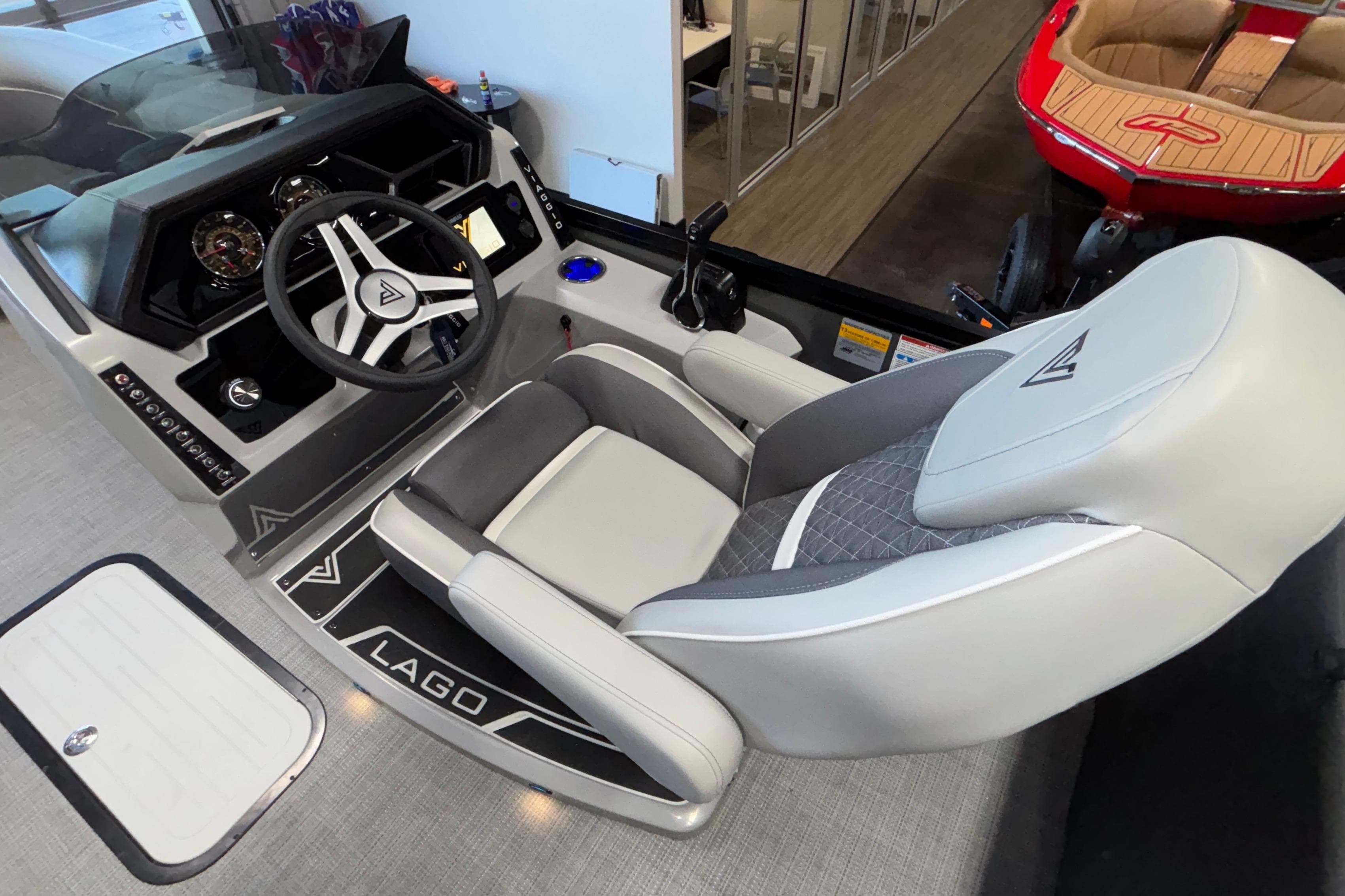Interior of 2026 Viaggio Z24U boat with modern steering and seating.