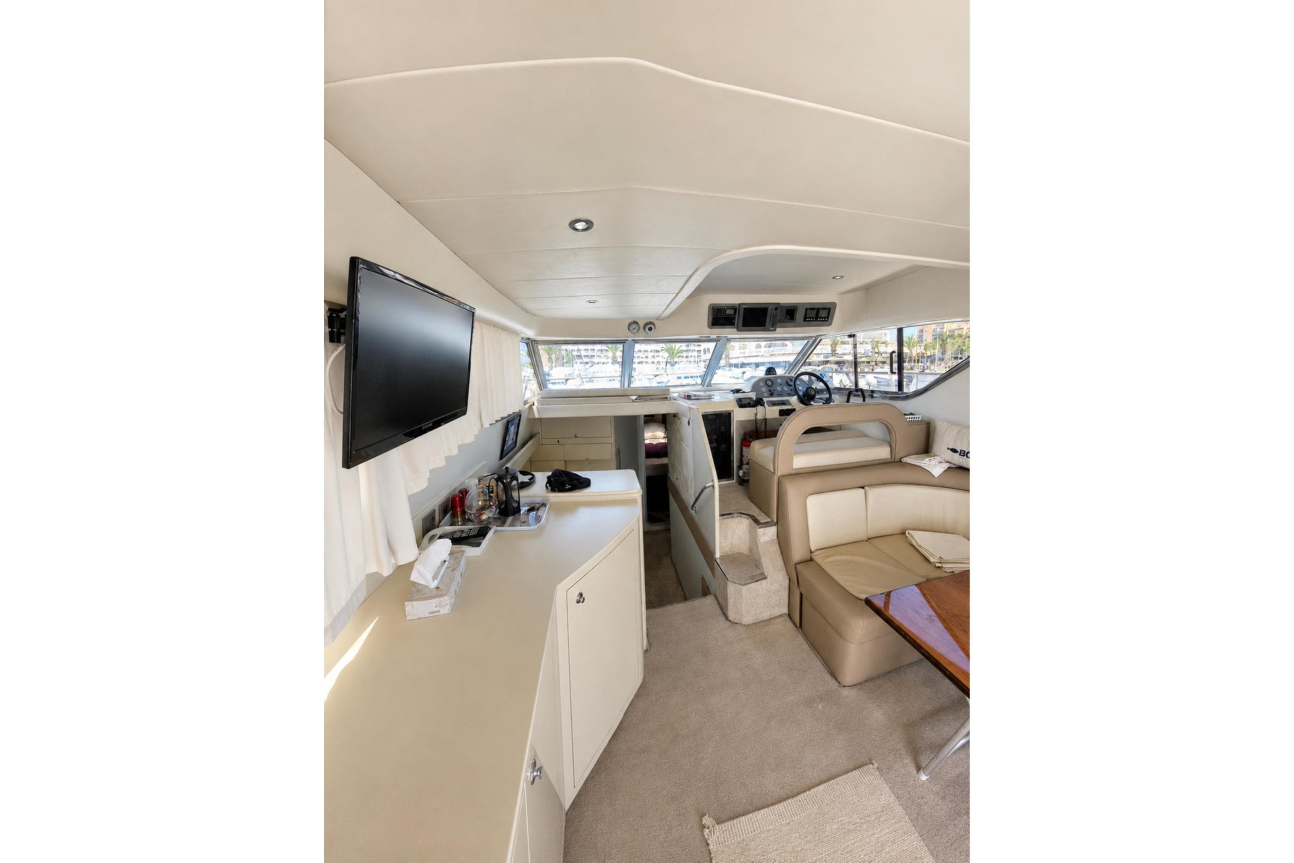 Interior of 1993 Princess 410 yacht with modern amenities and comfortable seating.