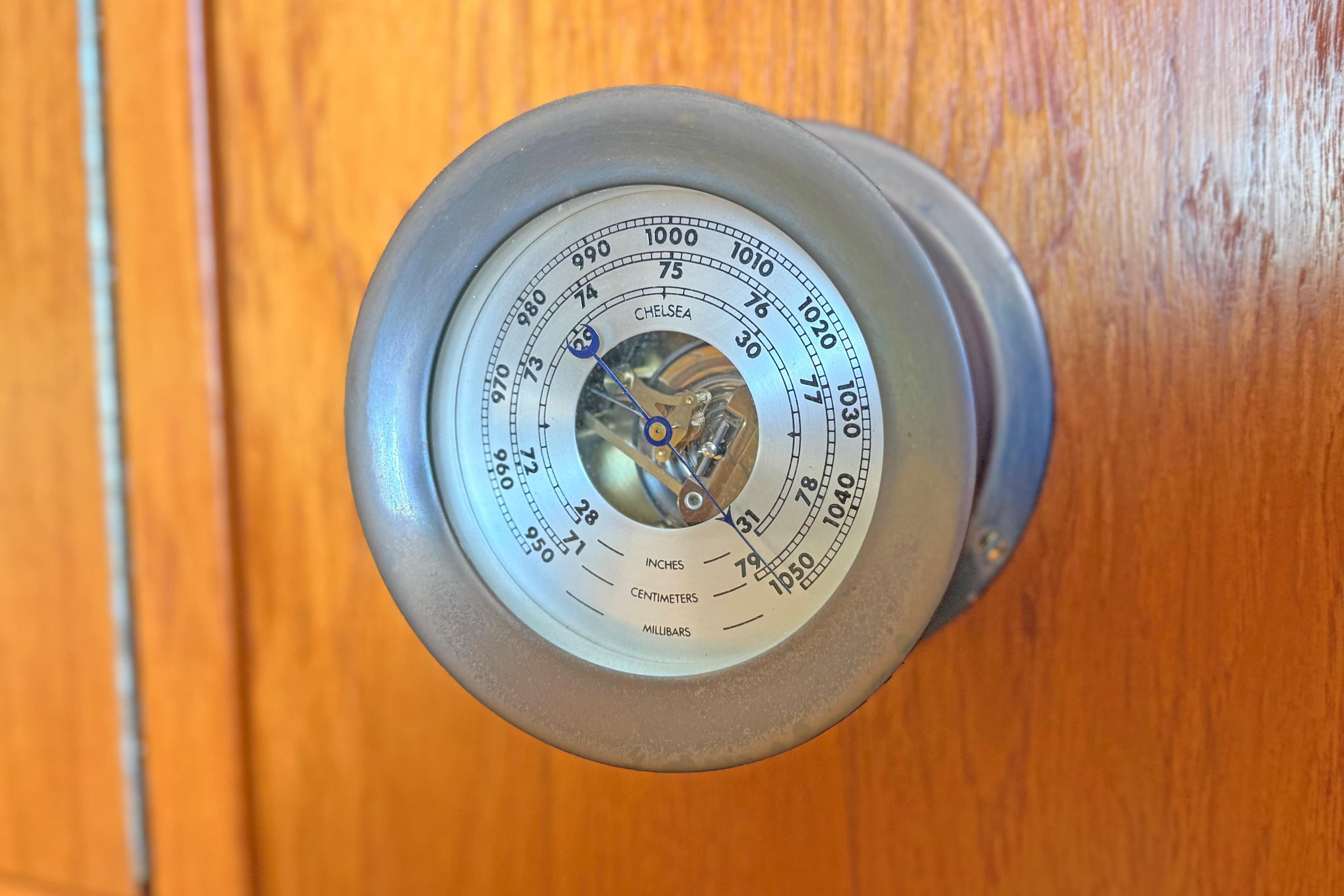 Barometer on Tiara 3700 Open Hardtop yacht, 1996 model, mounted on wooden panel.