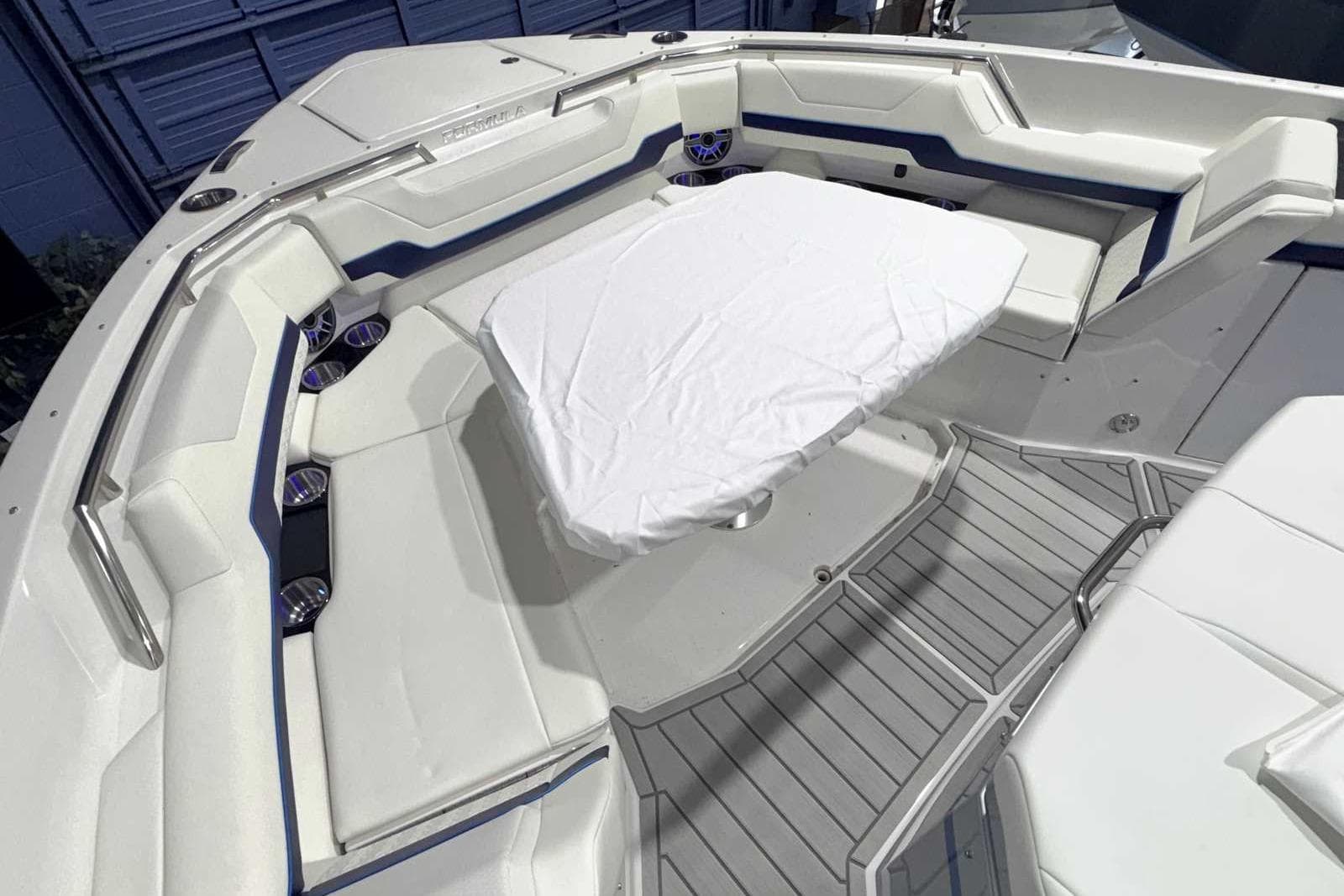 2025 Formula 387 Center Console Fish boat with spacious seating and sleek design.