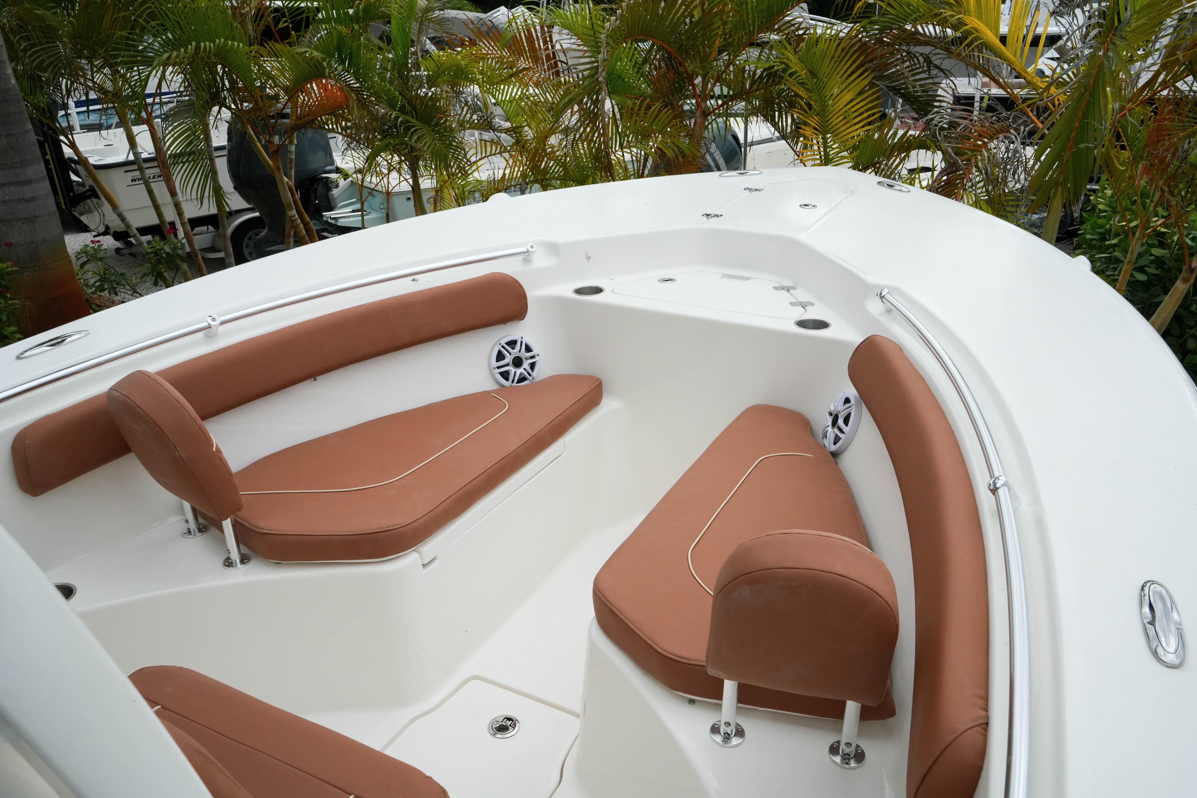 2026 Key West 244 Center Console boat with tan seating and sleek design.
