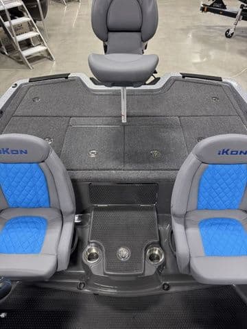 2026 Ikon Boats LXL20 interior with gray and blue seating, showcasing modern design and functionality.