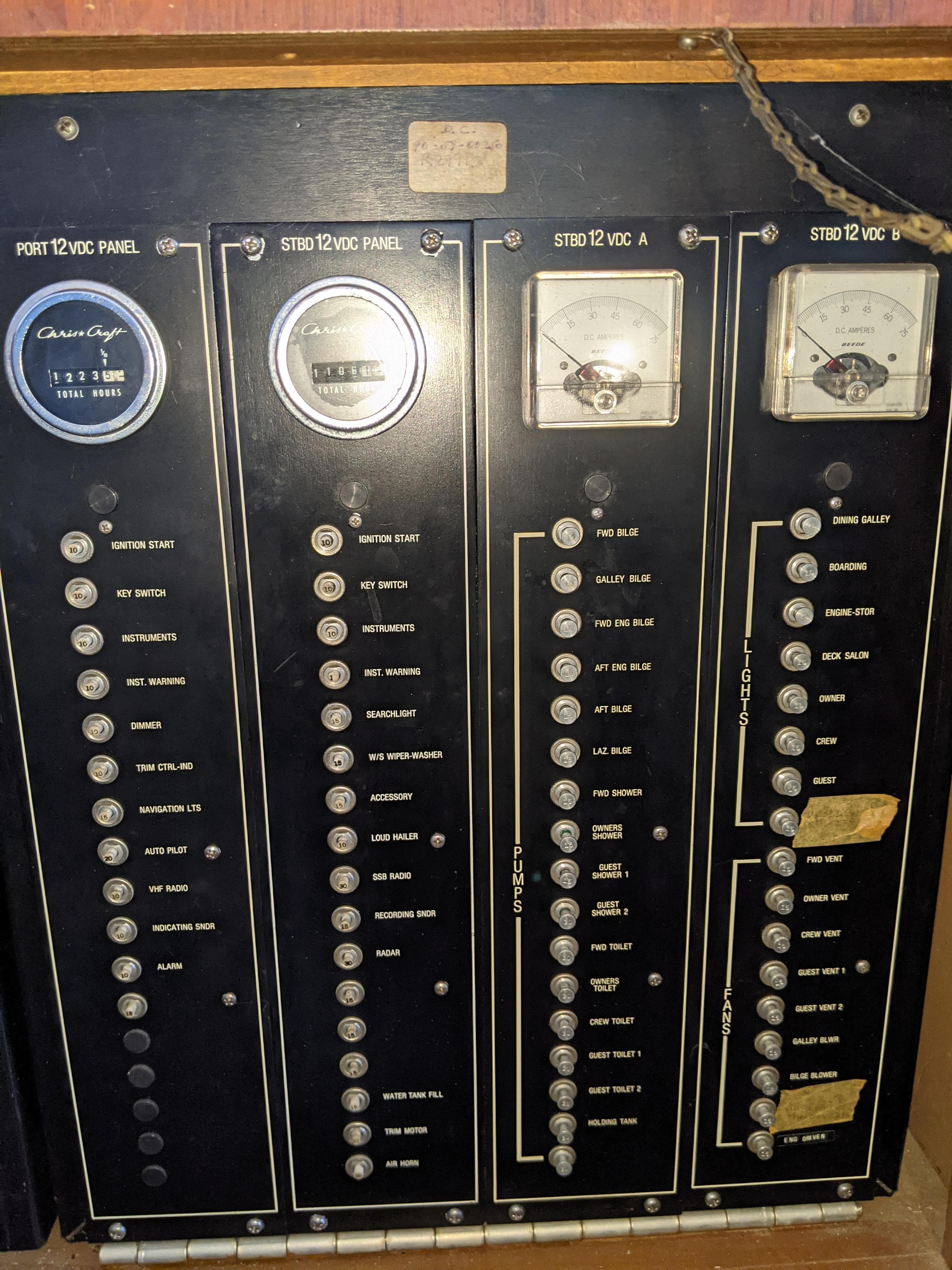 1976 Chris-Craft Roamer electrical control panel with gauges and switches.