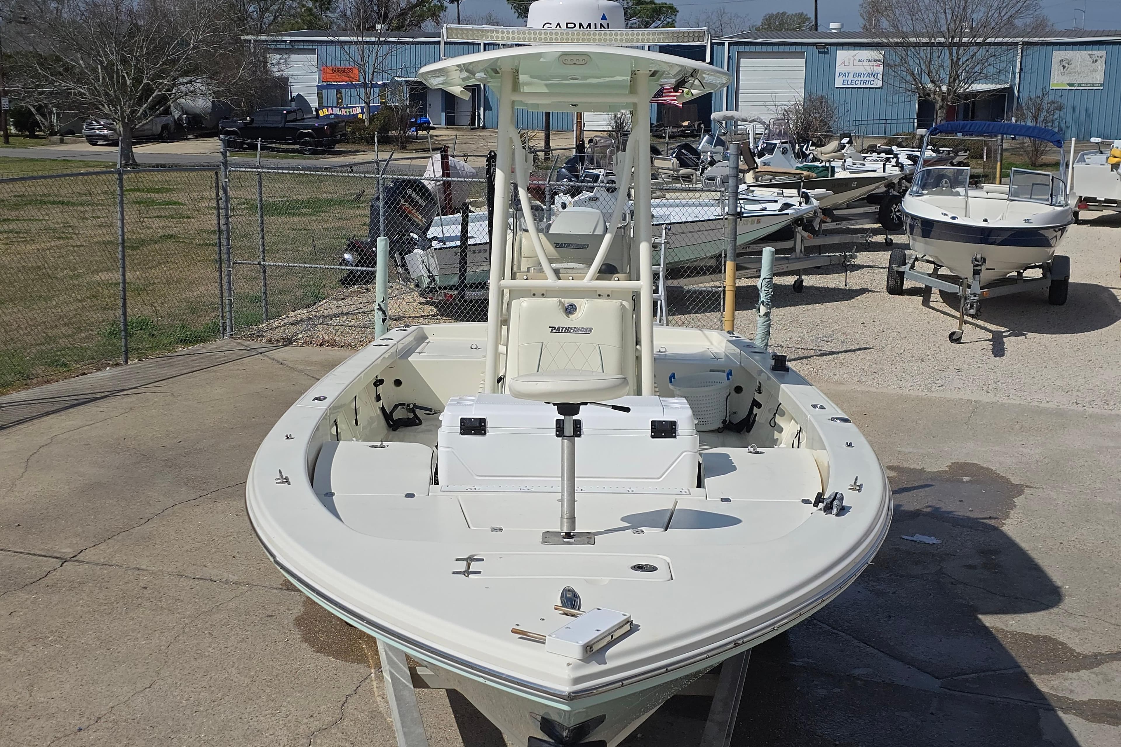 2016 Pathfinder 2600 HPS boat displayed outdoors at a dealership.