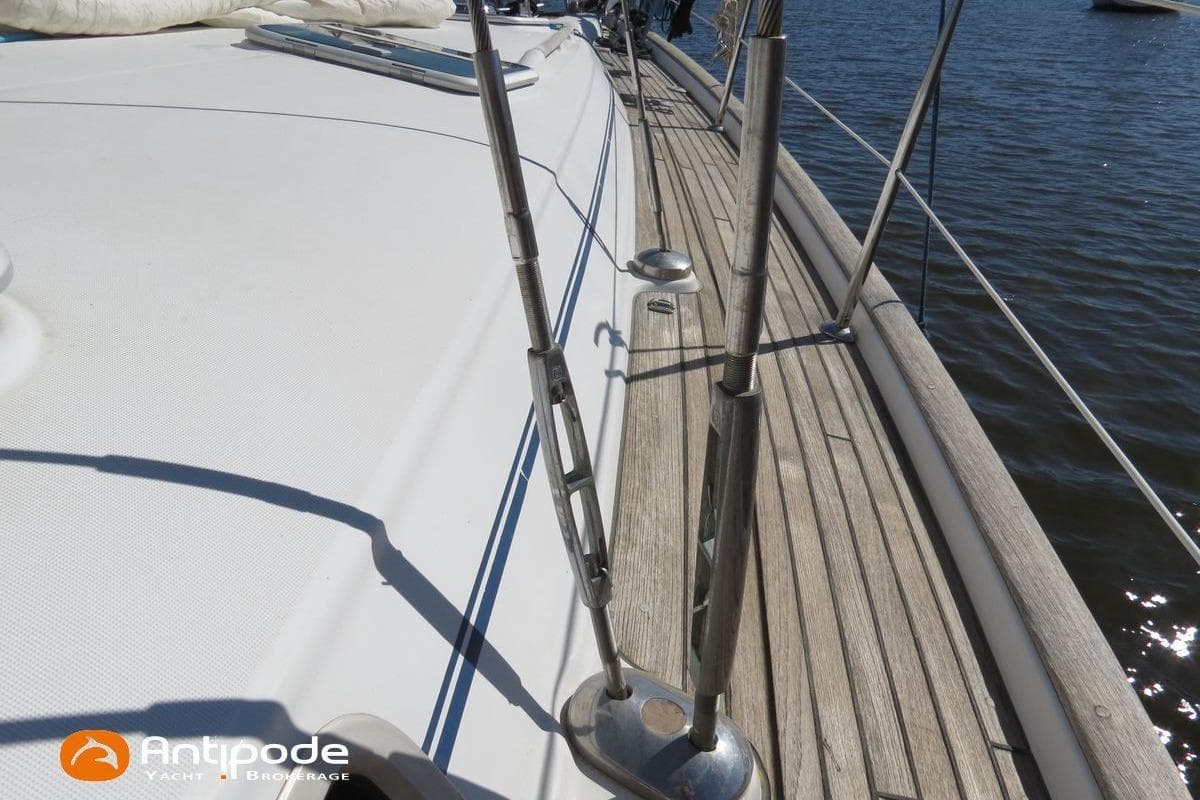 Deck view of a 2003 Beneteau Oceanis 411 yacht with wooden details.