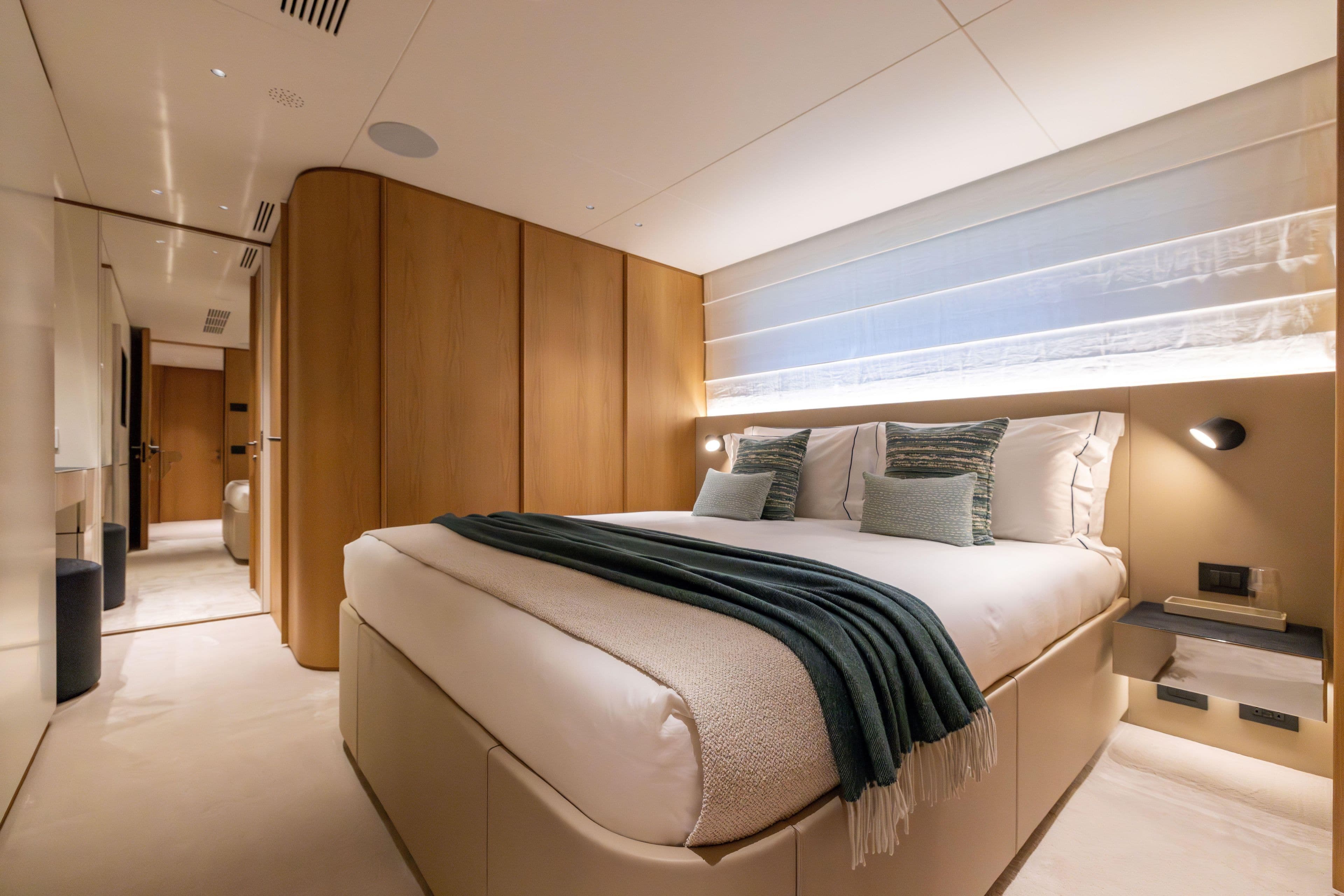 Luxurious bedroom interior of 2024 Benetti Oasis 34M Co Ownership yacht.