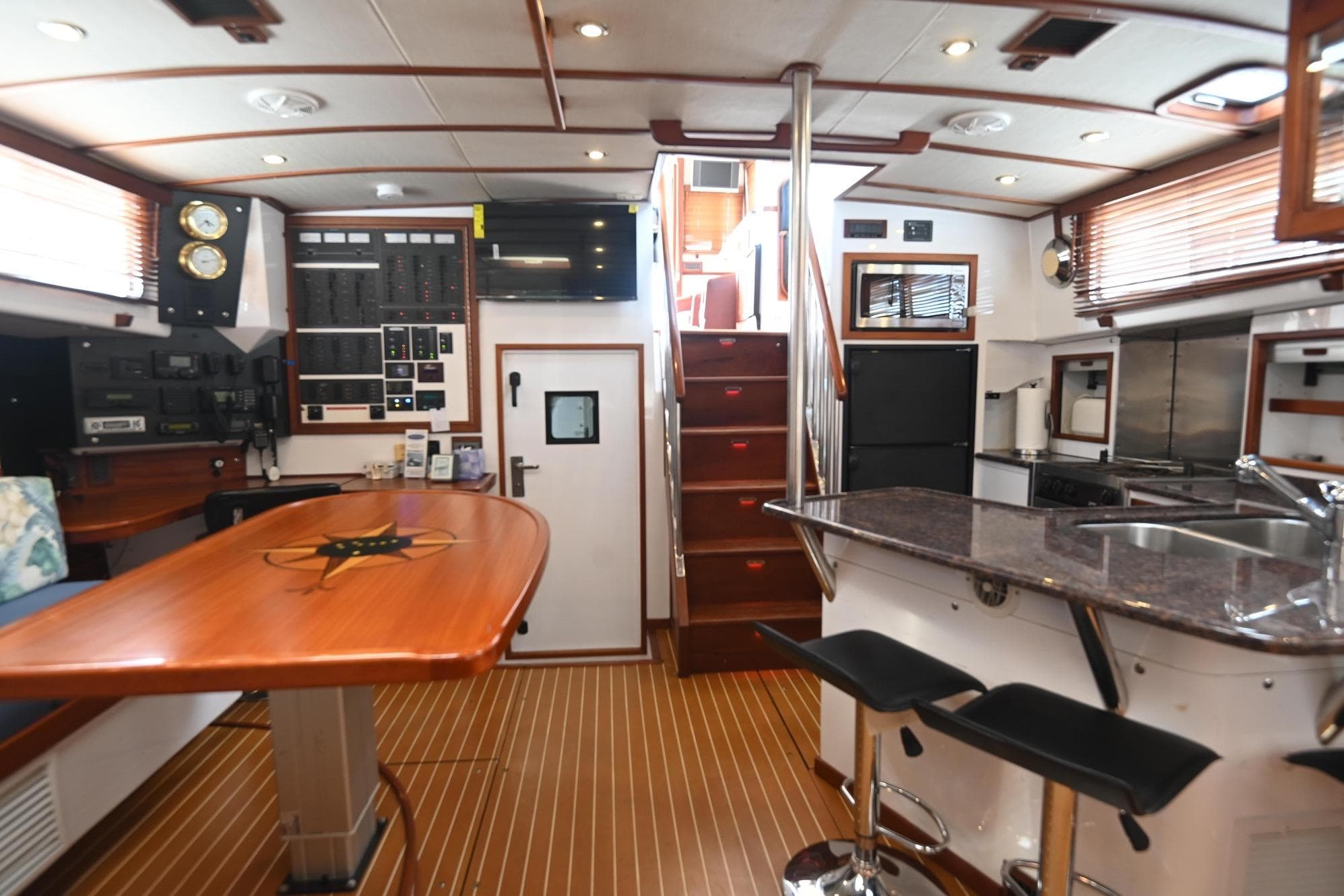 Luxurious 2007 Pilot Cruiser Expedition yacht interior with modern kitchen and navigation controls.