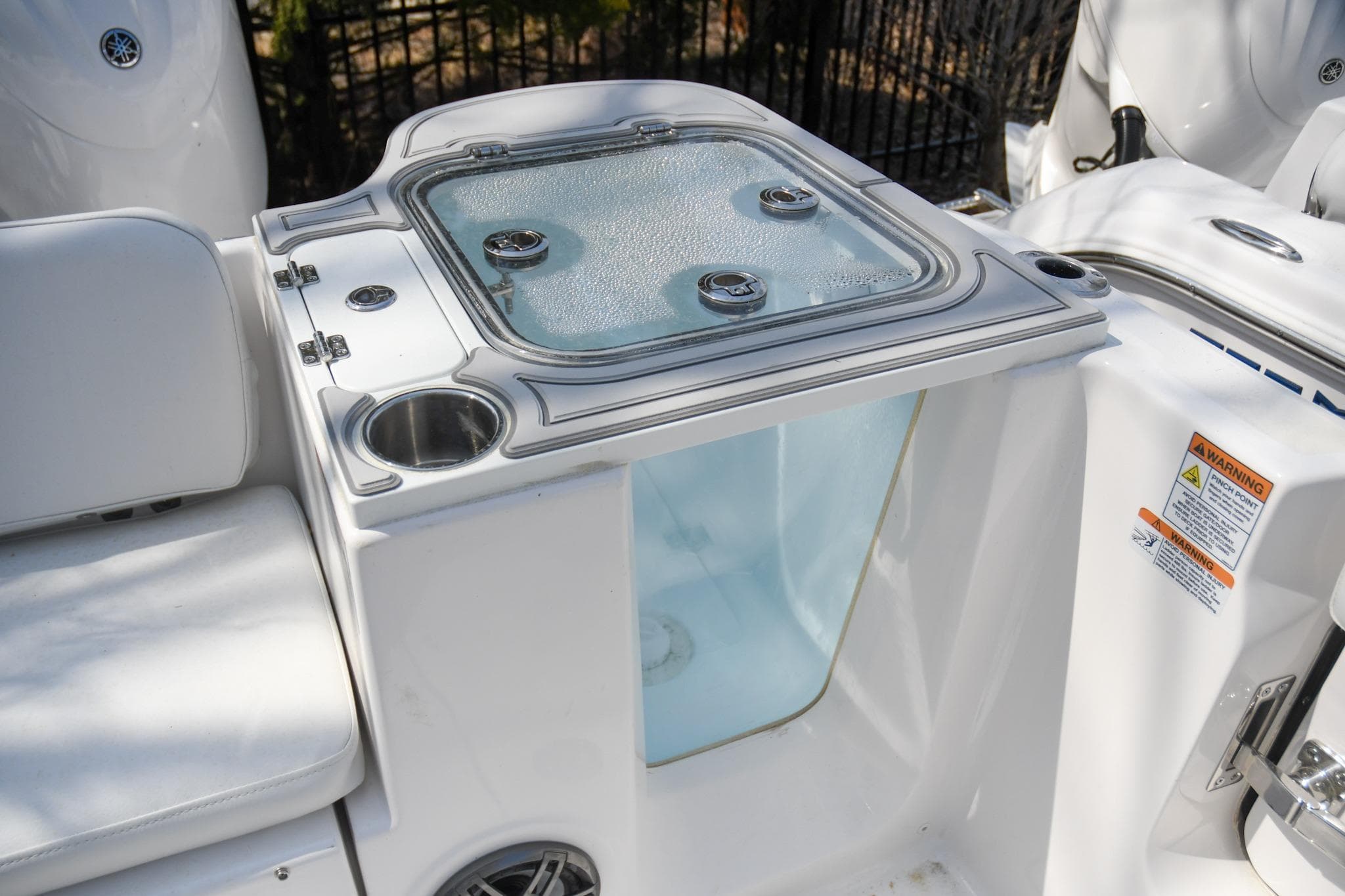 2026 Sea Fox 268 Commander boat with livewell and cup holder on deck.