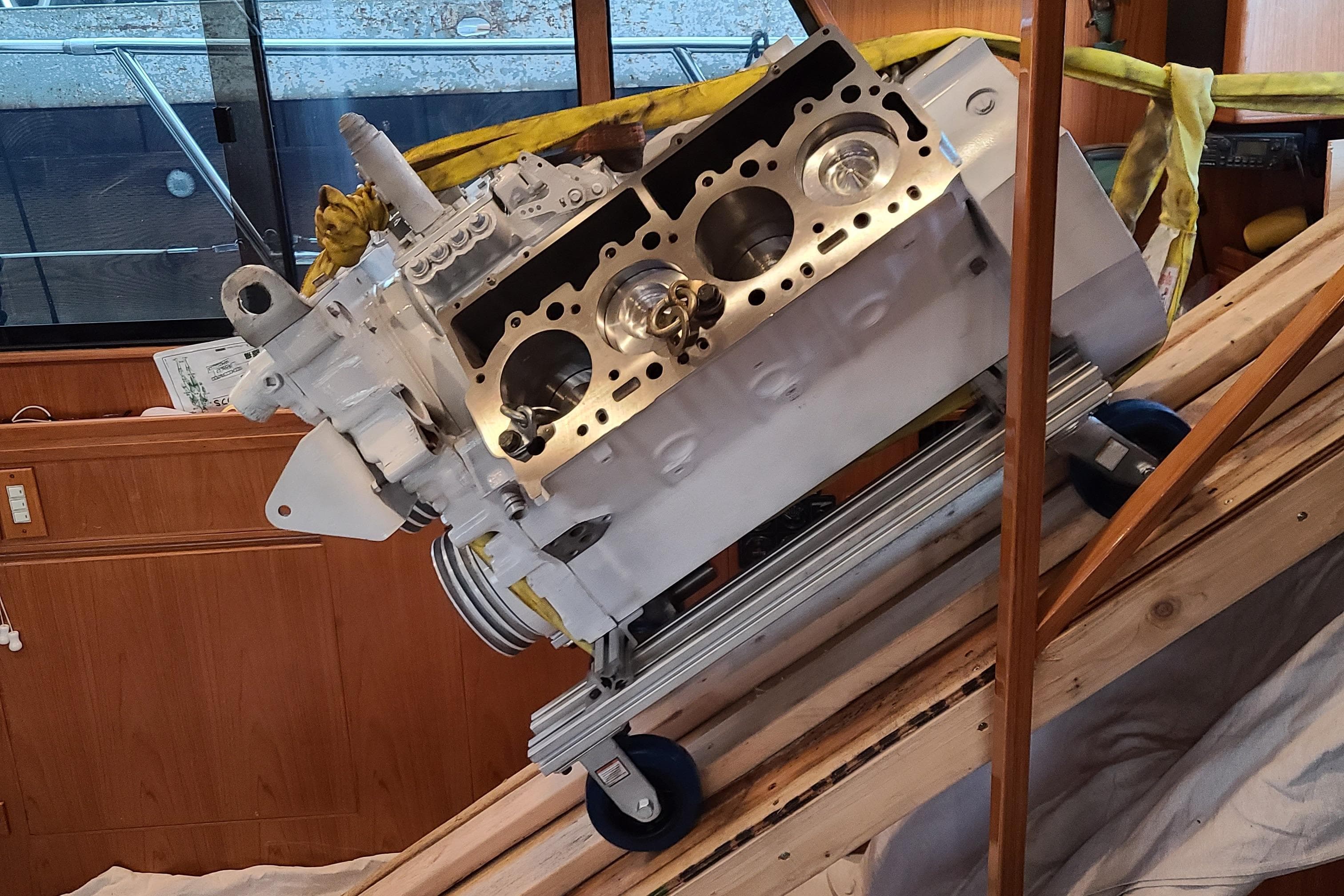 New fully rebuilt engines being reinstalled. Ramp system for installation. Engine blocks were sleeved and rebored by Cam Grinders in Seattle.