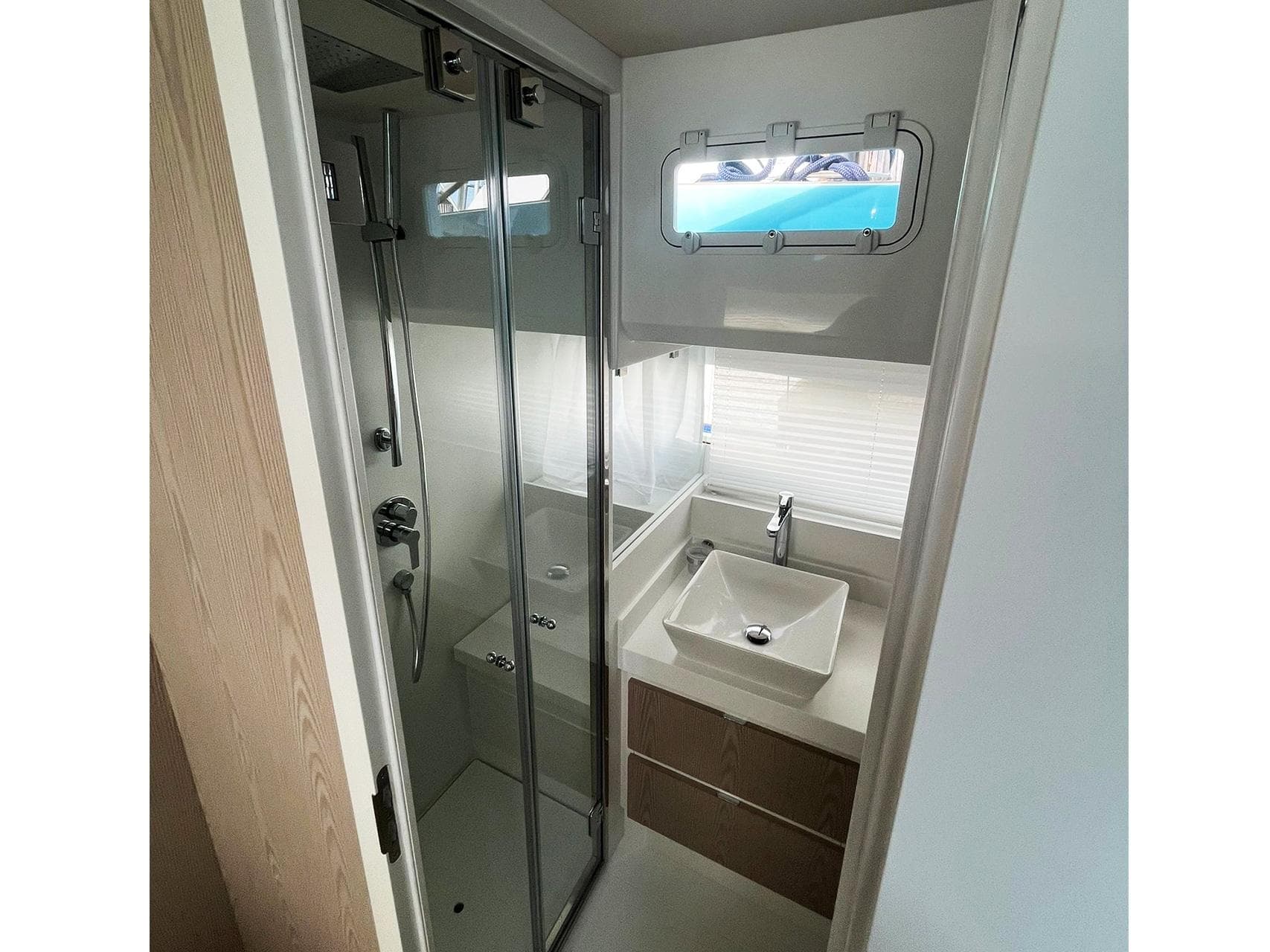 Modern bathroom in 2025 Fiart 39 Seawalker yacht with shower and sink.
