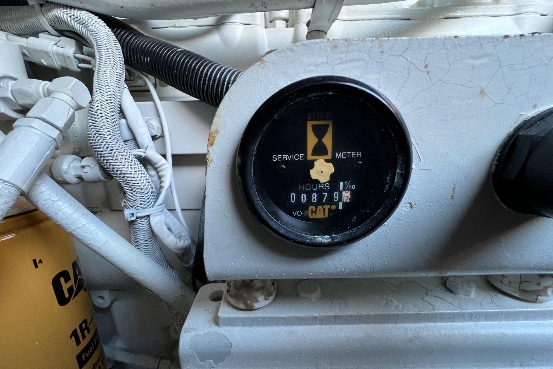 Engine service meter on 1998 Sea Ray 540 Sundancer, showing 879 hours.
