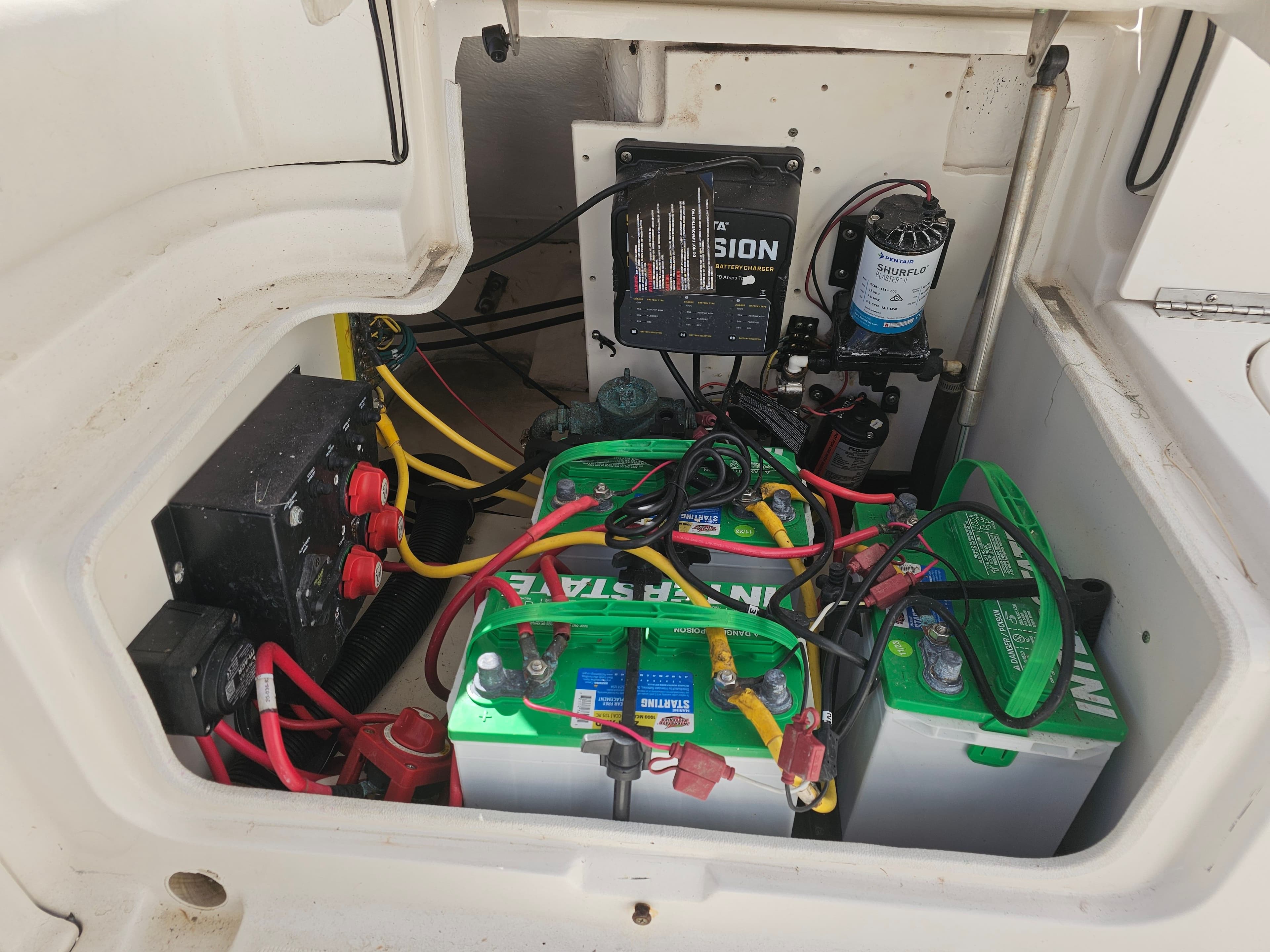 Battery compartment of a 2006 Robalo R265 Walkaround boat.