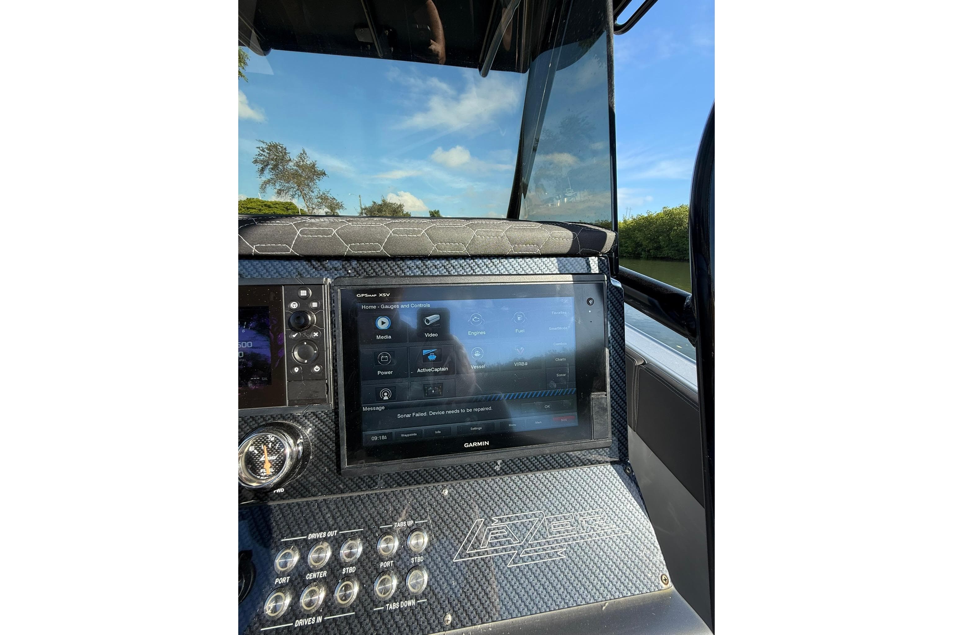 Dashboard of a 2006 Lazer 40 boat with Garmin GPS display.