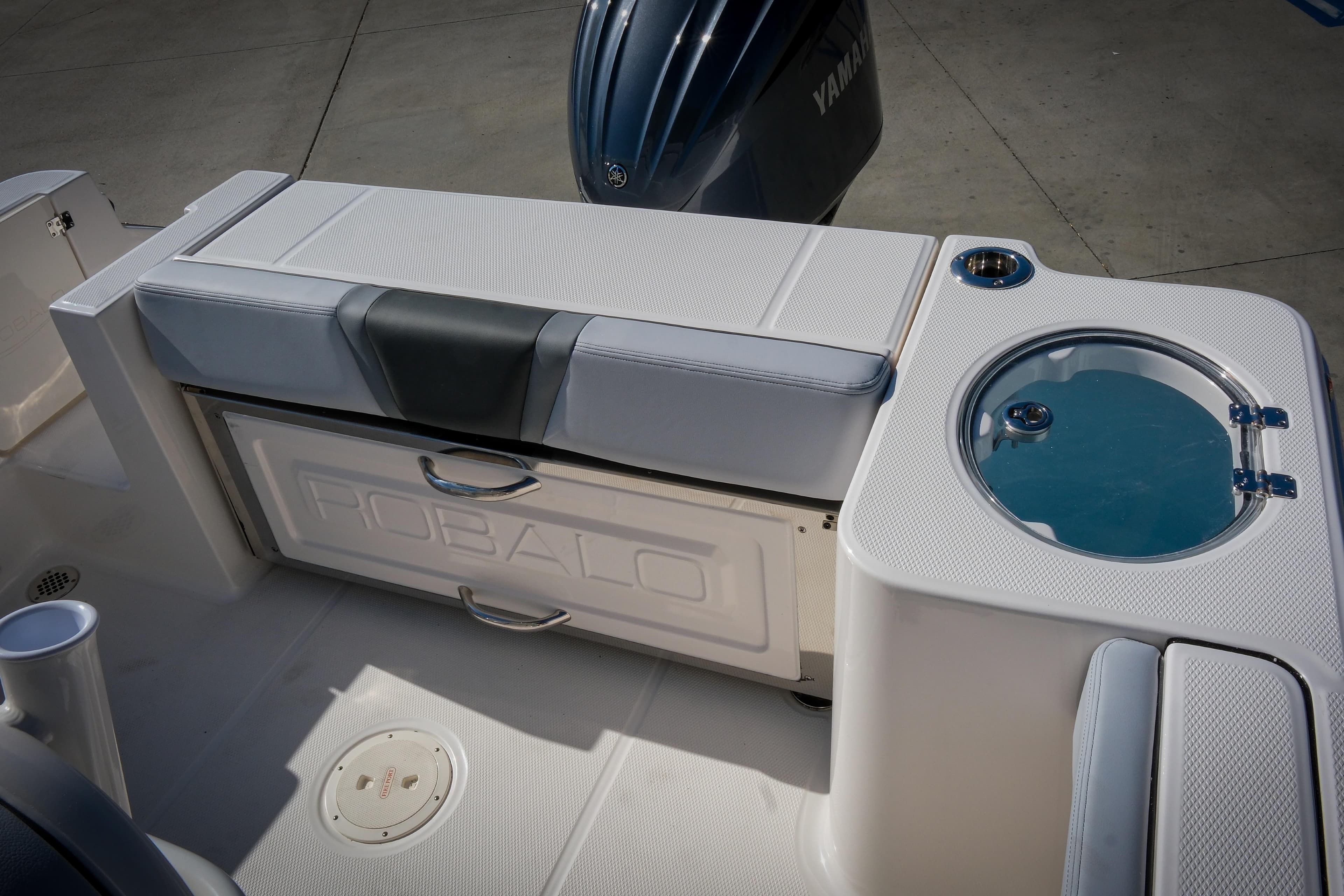 2025 Robalo R230 Center Console boat interior with seating and storage features.