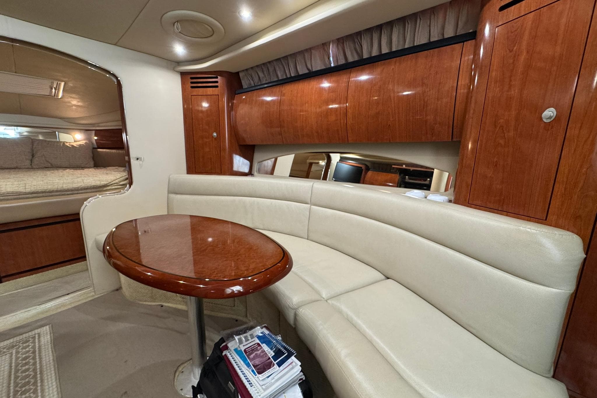 Luxurious interior of 2005 Sea Ray 360 Sundancer yacht with elegant wood finishes.